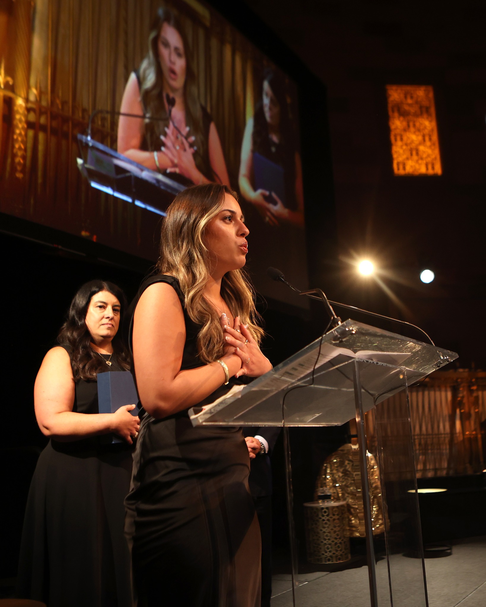 Happy Birthday, Sydney Sherwood! 🎗️🎂🎗️
For 18 years, Sydney has been the heart and soul of Arms Wide Open, and so much of what we do simply wouldn't be possible without her.
As the sister of two-time childhood cancer survivor Billy Jr., Sydney brings something that can't be taught and can't be measured: lived experience, genuine empathy, and an old soul that quietly makes everyone around her feel seen and valued.
From calling raffle numbers at age six, to singing at our Remembrance Services, to hosting "For Siblings, by Siblings" her journey with us has been nothing short of extraordinary. She shows up, rolls up her sleeves, and gives everything she has with a smile every single time.
Being a sibling of someone diagnosed with childhood cancer is one of the hardest things a young person can experience. It would be completely natural to step back, to protect yourself, to walk away from the pain. But that has never been Sydney's way. Instead, she leans in. She walks back into hospitals to deliver gifts to children in treatment. She sits with siblings who are hurting. She shows up for the hard moments that most people would find too difficult to face. That kind of courage and compassion is rare at any age.
Sydney, watching you grow into the remarkable young woman you are has been one of our greatest joys. You are a true gift to us, your family and the entire childhood cancer community.
Wishing you the happiest of birthdays. You deserve every bit of it! 🎗️🎗️🎗️