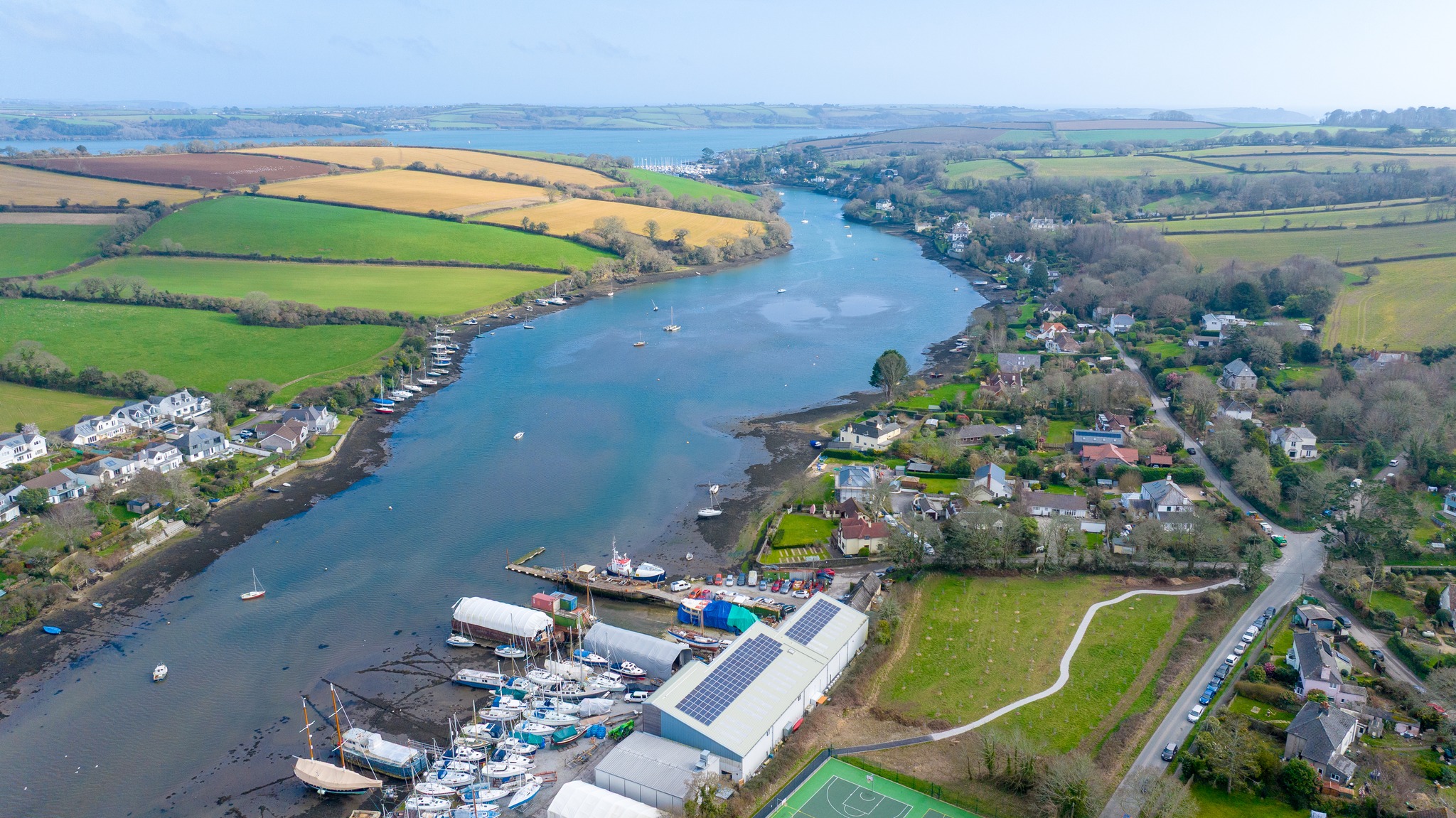 Another fantastic moment from my recent drone work in Mylor Bridge 🌿
This wider aerial shot captures the full setting of the new Mylor Community Orchard, beautifully positioned alongside Mylor Creek at King George V Playing Field.
From above, you can really appreciate how the orchard sits within this valued community space - surrounded by open green areas, sports facilities, and the accessible creekside walkway. Seeing the orchard in its wider landscape highlights just how special this location is, not only for growing fruit trees but for bringing people together in a space that’s inclusive, sustainable, and designed for everyone. 🌳✨
Projects like this are a brilliant example of how thoughtful planning and community funding can enhance green spaces while improving accessibility and encouraging outdoor learning.
Proud to help document it from the air 🚁
#MylorBridge #MylorCreek #CommunityOrchard #CornwallLife #DronePhotography #AerialView #Cornwall #GreenSpaces #Sustainability #CommunityProject #AccessibleOutdoors #SupportLocal #CornishCoast