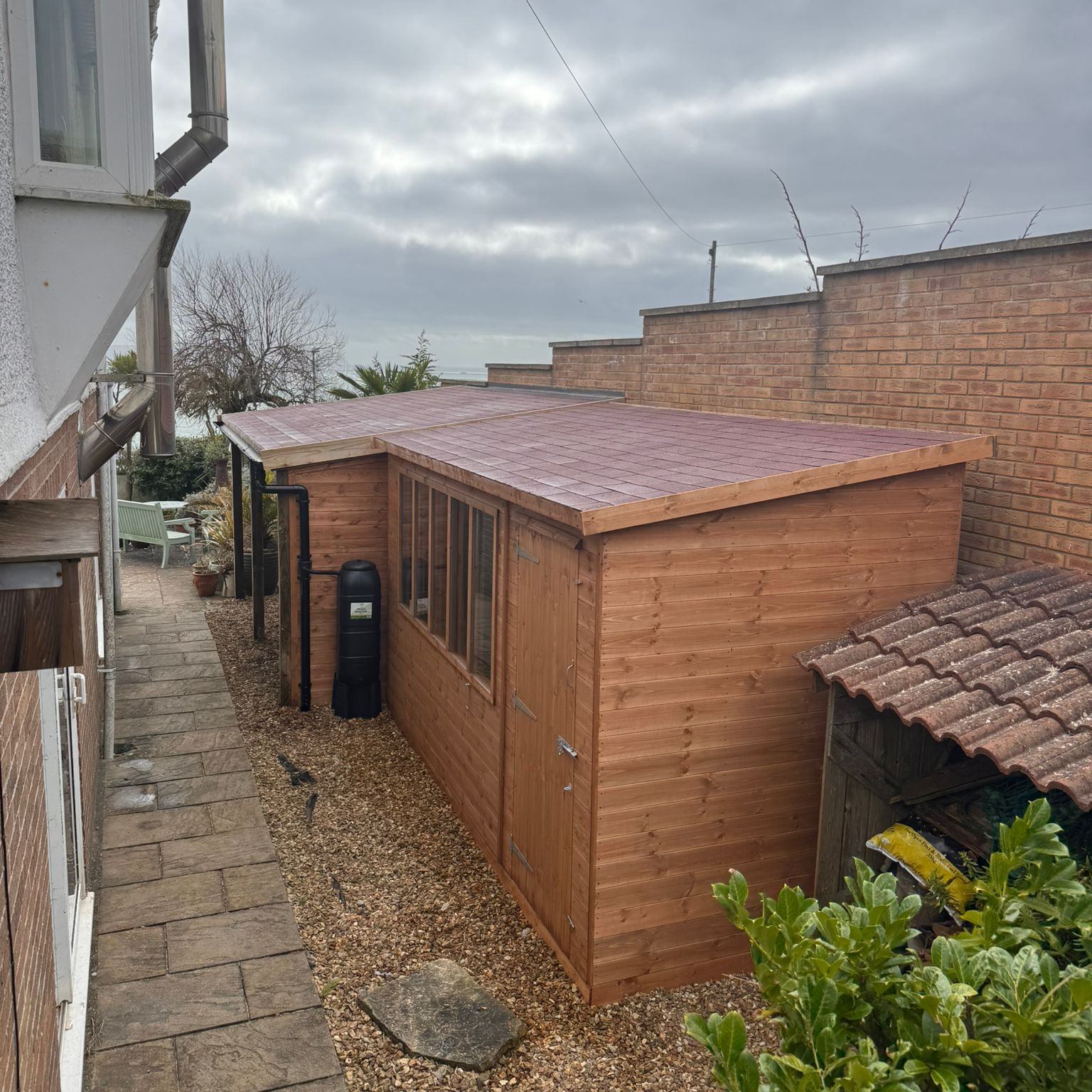 Trio of jobs completed for a customer in Weymouth last week.
1. 10' by 8' Apex Summerhouse with 2' Canopy in TGV.
2. 13' by 6' Reverse Pent in TGV with red felt roof shingle tiles.
3. 5m by 3.5m lean too with end TGV wall, red felt shingle tile and guttering system.
www.halstocksheds.co.uk