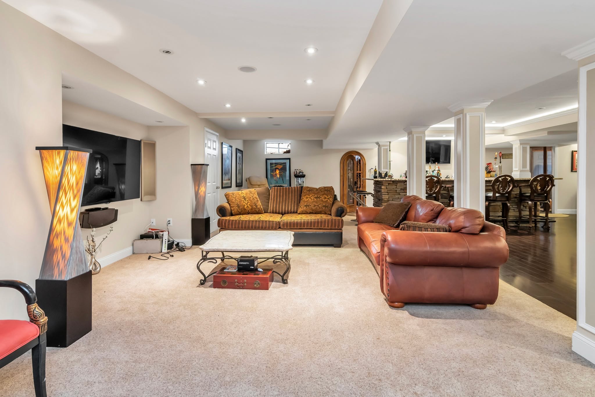 This is the granddaddy of basements. It features a full walk-in wine cellar, a stone-clad bar, leather lounge seating, and a grand piano corner for hosting. Warm LED stair and ceiling lighting set the mood, and on the other side... the games. It's a must see. DM me the word BASEMENT for the listing with all the photos. 😊
.
.
.
.
.
.
.
.
.
#BasementDesign #JMRealEstatePhoto #InteriorDesign