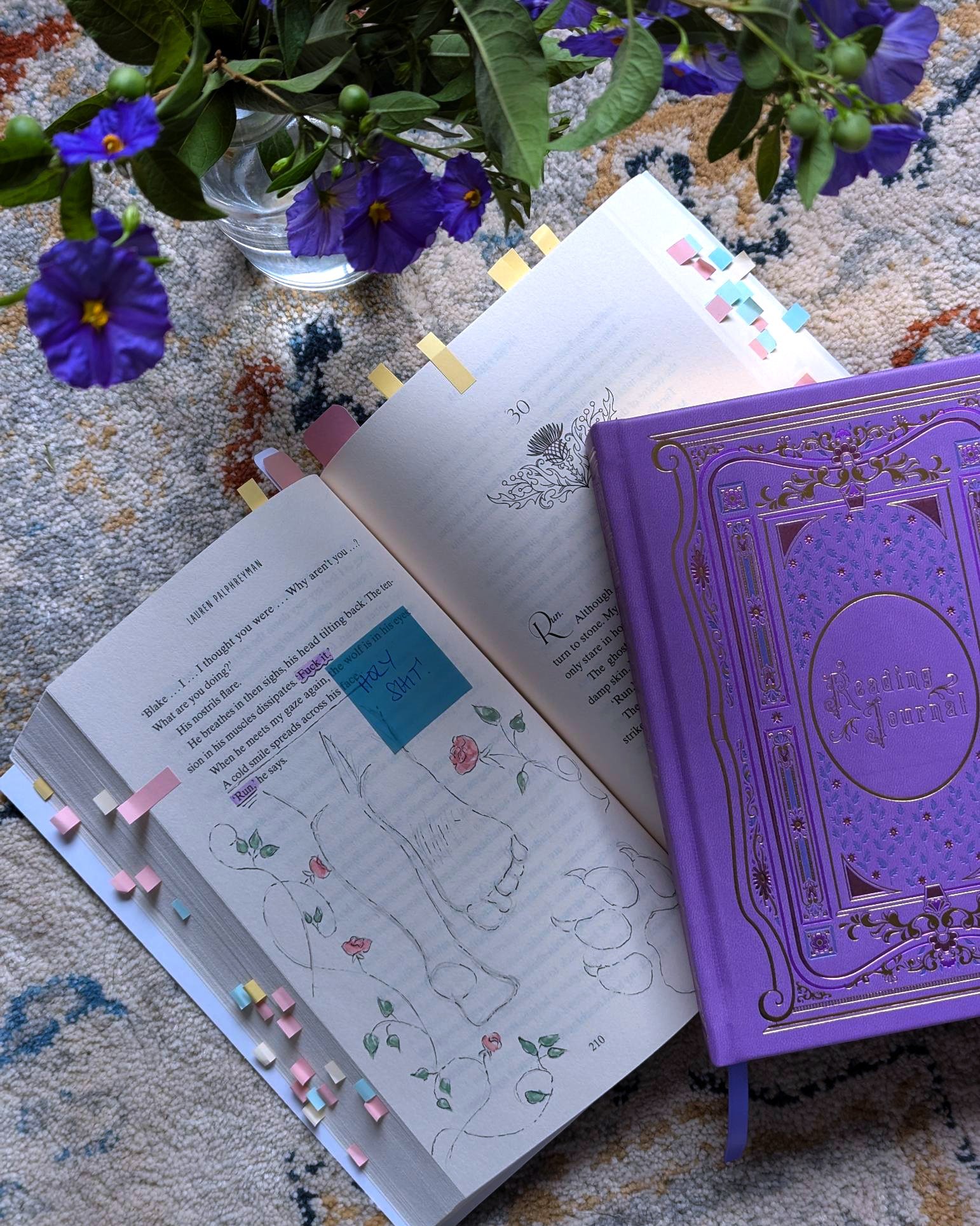 I know it feels sacrilegious, but please believe me when I say that sometimes drawing in a book is exactly what you need ๐
I started annotating recently for a reason that's long-winded and not worth the explanation, but if I'm honest, I expected to find it boring. Like, just another task to do, and no real joy behind it.
It was the opposite... Putting little sticky notes in pages I wanted to return to meant I got to sink into the moments that stuck out for me (I'm a fast reader; I didn't realize how many emotional beats that meant I was forgetting when I only spent a few seconds with each one).
And then coming back to sketch a little on my favorite page became a spot of reader joy. It turned a TBR checklist into a collab with a book I properly engaged with, from start to finish, instead of ticked off to meet some arbitrary goal.
So... do recommend! Let me know if you give it a go ๐ค
(Recognize the book? โจ I'm a simple girl. Love a lil primal chase vibe from an unexpected source)
#romantasy #artsy #bookart #bookish