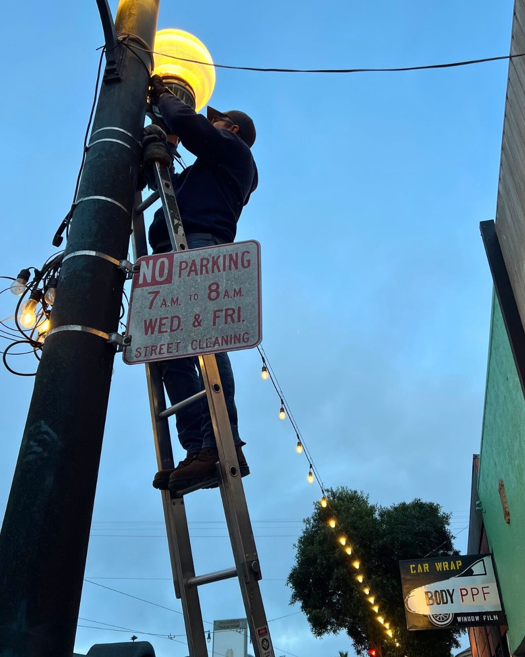 Ocean Avenue is lighting up again 💡✨ Thanks to support from Avenue Greenlight @avenuegreenlight, lighting repairs and installations are underway across the corridor to help brighten the street and support a welcoming environment for neighbors, visitors, and local businesses. 🌙
These photos show Jose and Obdulio from Greenforce Outdoor Light in action as they install and repair the lights throughout the district. Gratitude as well to the many small businesses serving as connection points along Ocean Avenue and in Lakeside Village that help make this lighting network possible. @friendsoflakesidevillage
Most of the maintenance work has now been completed, with a few strings still in progress. If you notice any lighting issues along the corridor, please let the Ocean Avenue Association know so they can be addressed. 🙂
#ingleside #oceanavesf #community #communityevent #oceanave #avenuegreenlight