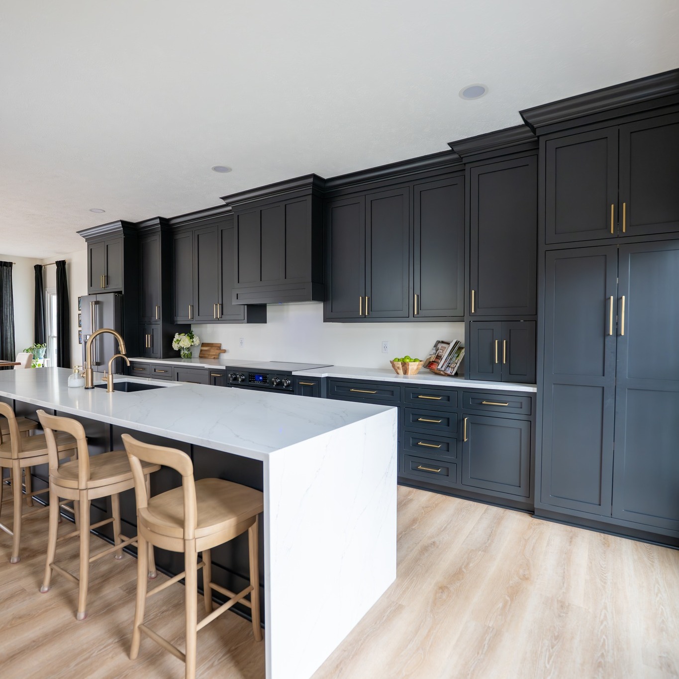 ✨One more look at this kitchen transformation ✨
Design details that make the difference:
• Full-height cabinetry for an elevated taller space
• Waterfall quartz island for a clean modern statement
• Warm gold fixtures and hardware to soften the dark cabinetry
• Light flooring to balance the depth of the cabinet color
The result is a kitchen that feels elevated, intentional, and designed to live beautifully every day.
#kitchenremodel #interiordesign #kitchendesign #remodelinspiration #customkitchen #kitchenisland #interiordesignerlife #luxuryinteriors #homerenovation #kitcheninspo #clevelandohio #interiordesigner ##kitchenbeforeandafter #kitchenremodel #kitchenreveal #interiordesign #kitchendesign #modernkitchen #homebeforeandafter #remodelinspiration #customkitchen #kitchenisland #designmatters #interiordesignerlife #luxuryinteriors #homerenovation #kitcheninspo #clevelandohio #interiordesigner ##customdesıgncustomdesign #blackandgold #blackcabinets