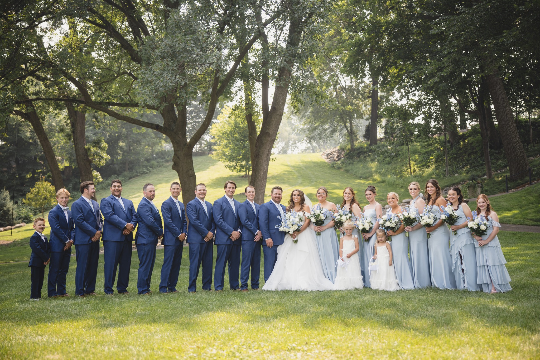 The crew that celebrates together stays together. 🥂
There’s nothing like stepping outside for a moment with your favorite people on the biggest day of your life. From laughter to unforgettable memories, your wedding party is there for it all — and we love seeing these moments come to life.
Cheers to the friends and family who make the celebration even sweeter. 💐
@wild.trail.studio
#WeddingParty
#WeddingDayCrew
#BrideSquad
#GroomSquad
#MinnesotaWeddings 💍