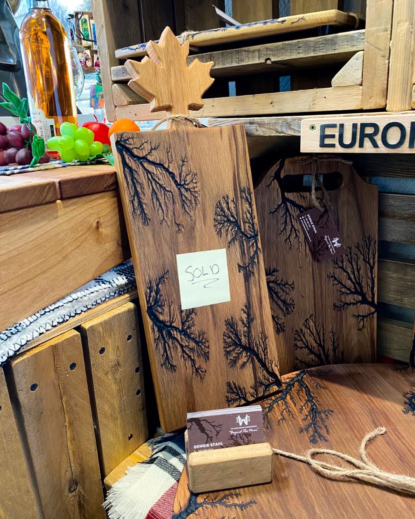 A happy collector purchased this gorgeous hand made cutting board by our March feature artist Dennis Stahl. Uniquely textured using electricity Dennis’s wood works are only available until the end of March!