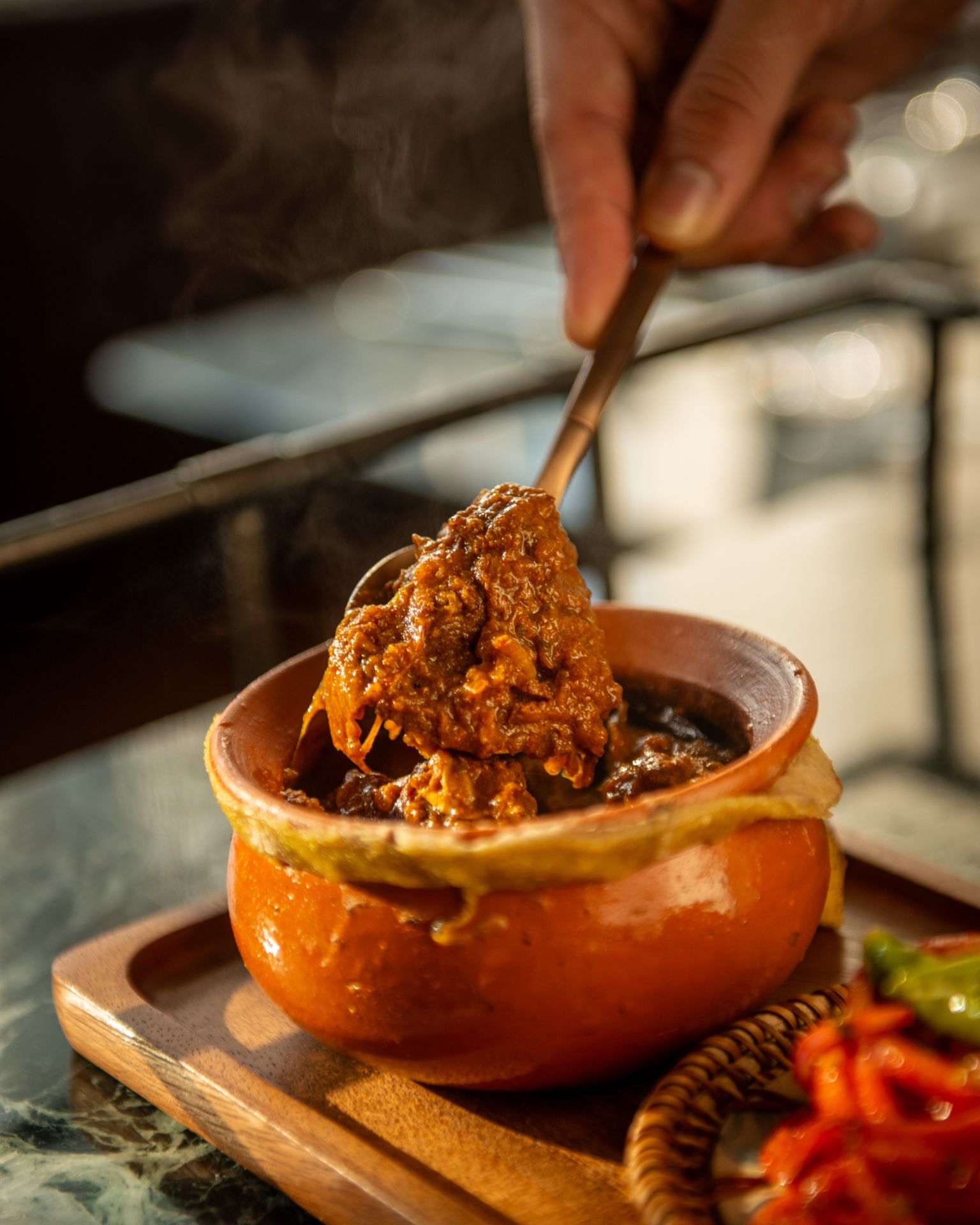 Slow-cooked comfort at its finest. Our Champaran Gosht features tender goat meat simmered gently in a claypot with garlic and mustard oil, allowing deep, rustic flavours to develop naturally over time.
Rich, aromatic, and meant to be savoured slowly.
Experience this regional classic today!
ความอร่อยแบบโฮมสไตล์ที่ต้องใช้เวลา
Champaran Gosht ของเราใช้เนื้อแพะคุณภาพดี เคี่ยวช้า ๆ ในหม้อดิน พร้อมกระเทียมและน้ำมันมัสตาร์ด เพื่อให้รสชาติกลมกล่อมลึกซึ้งในทุกคำ
เข้มข้น หอมเครื่องเทศ และควรค่ากับการค่อย ๆ ละเลียด
มาสัมผัสรสชาติแบบต้นตำรับได้ที่ Jharokha
👉🏼 For reservations: https://bit.ly/4iHLdW6
📞082-997-3399
📍Erawan Bangkok, Fl.2
🕒 Open Daily, 11:30 - 22:30
#JharokhabyIndus #JharokhaBkk #JharokhaBangkok #CelebratewithJharokha #IndianCuisine