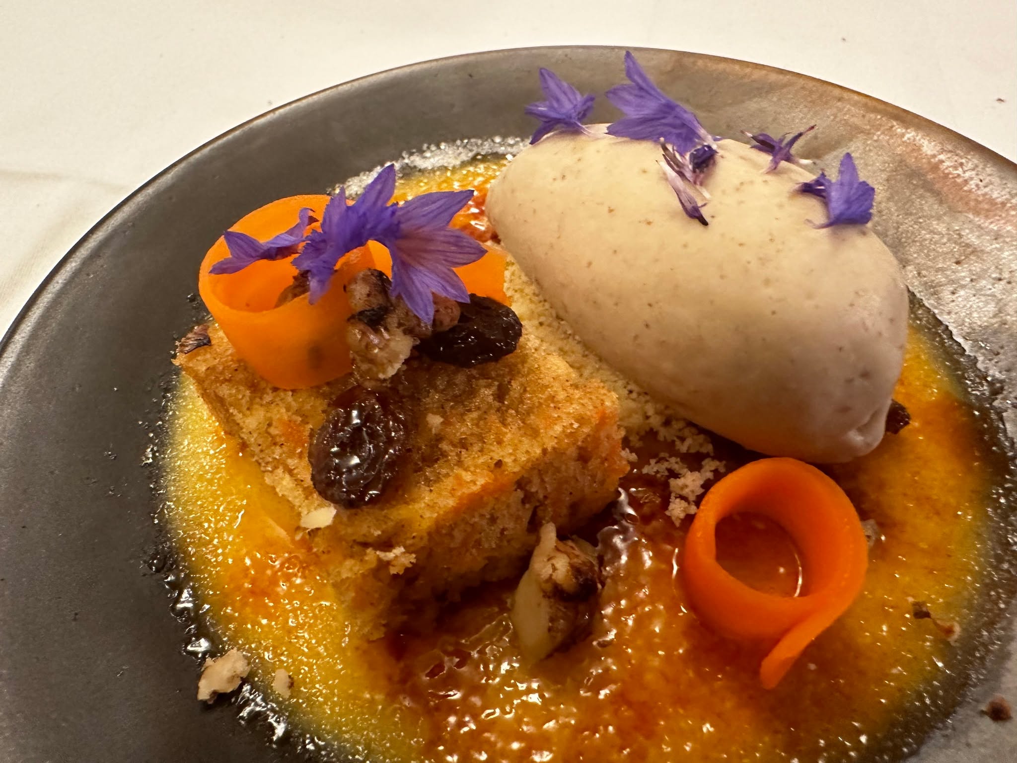 This remains a firm favorite on the dessert menu and rightly so, I think its an interesting and playful dessert...
Vanilla creme brulee set and glazed in the bowl then we dress on top of the caramelised sugar so your spoon dives down and into the cream when you eat the dish.
Vanilla creme brulle topped with carrot cake, walnuts & rum & raisin ice cream.
#gardenparties #reading #local #caterer #henley #summer #oxfordshire #privatechef #buffet #party #wedding #passion #luxury #dinner #bespoke #bowlfood #dessert #finedining