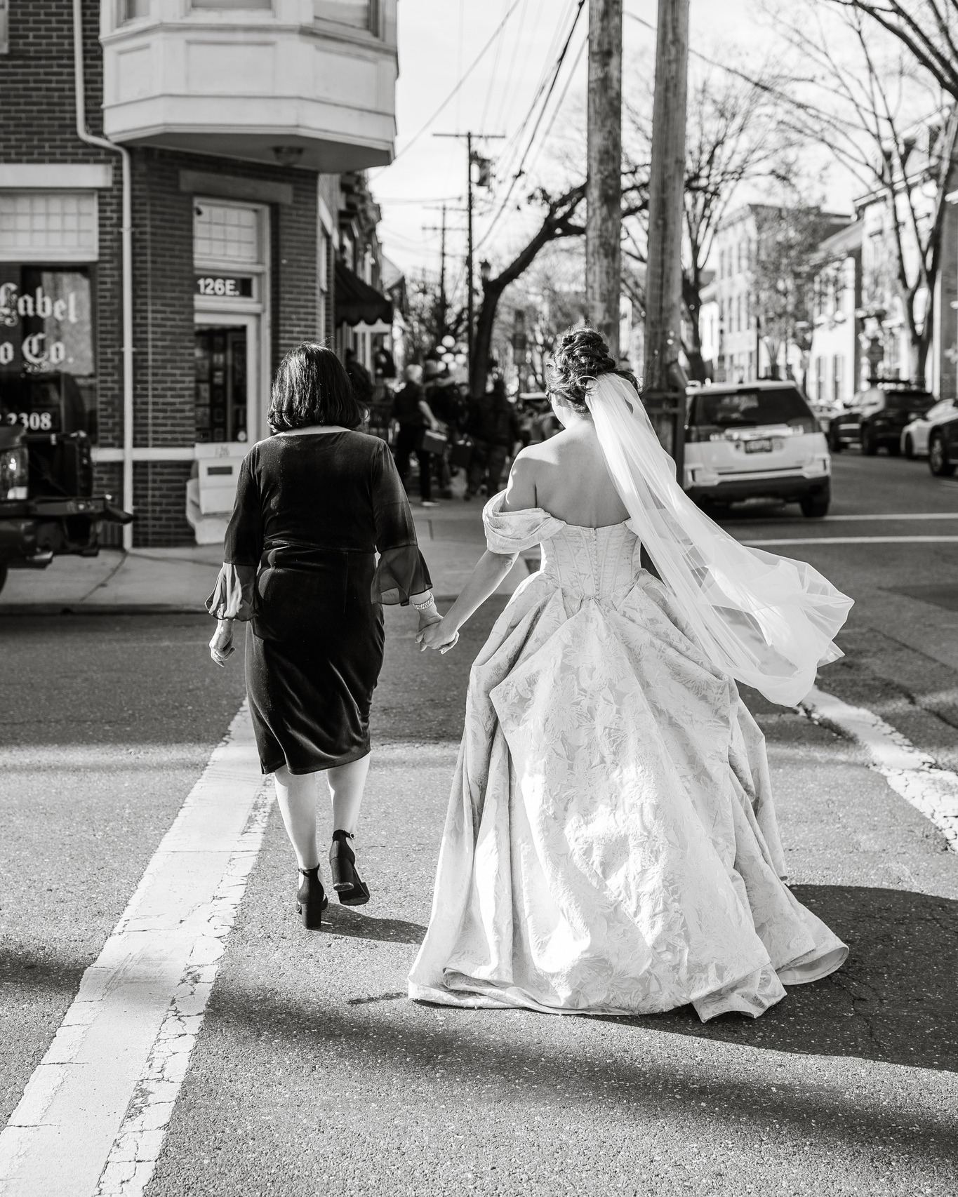 Who needs a fancy wedding party when you can stroll to the venue with your mom by your side!