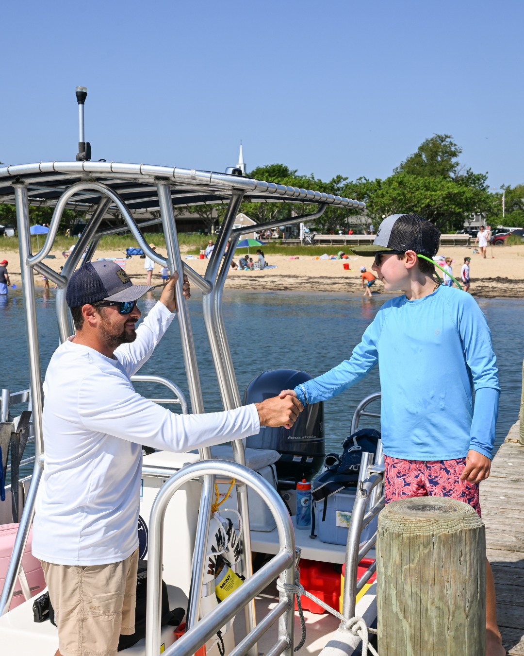 Catch-and-release for them, a little something chilled for you. 🥂🎣
We know that the best family memories happen when everyone is actually having fun. On our Sip & Fish charters, the kids get a hands-on introduction to the basics of Nantucket fishing, while the adults are invited to sit back and enjoy their favorite beverages on the harbor.
Bring your favorite drinks aboard The Wampum and experience the perfect Nantucket afternoon!