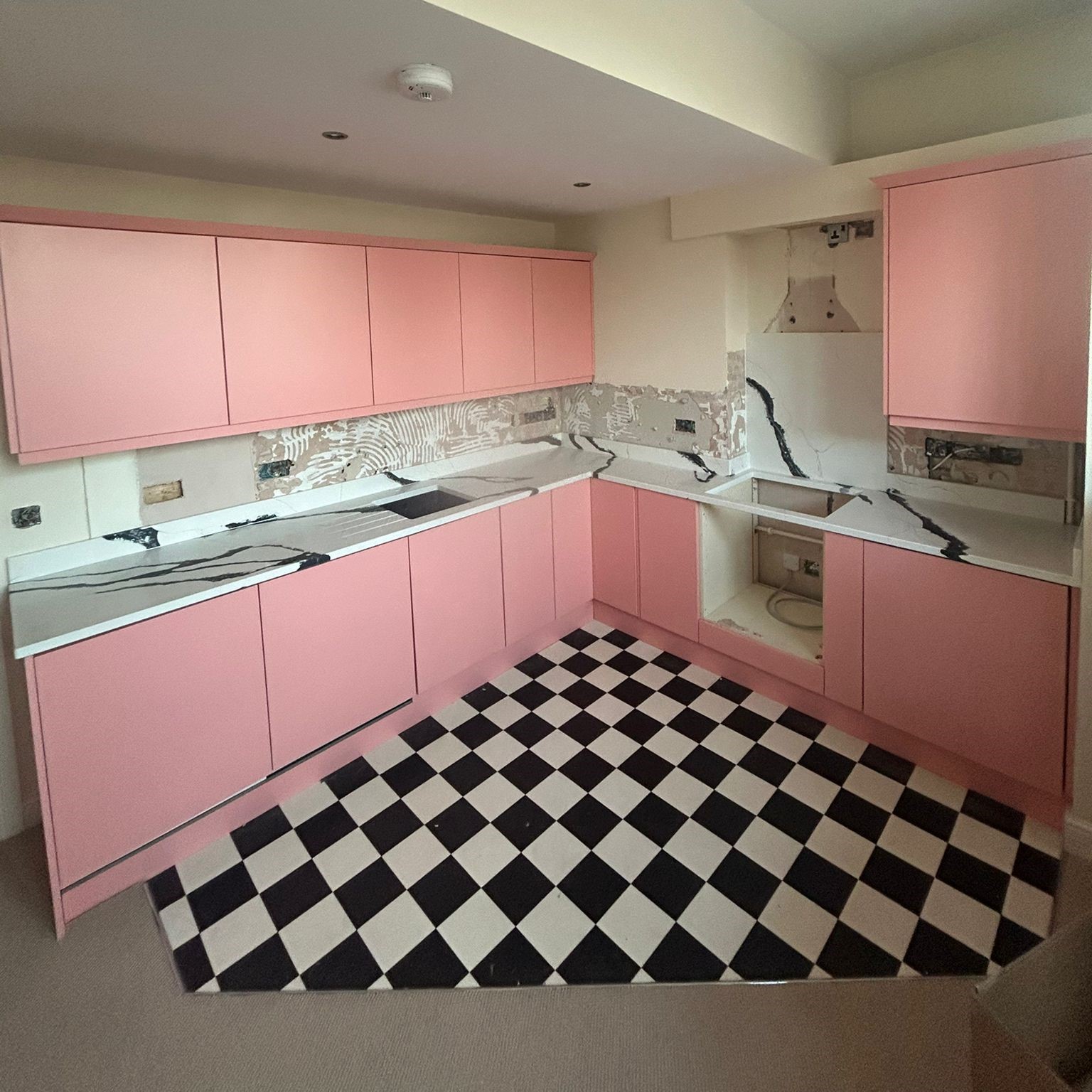 This one is wild! š¦š Blanc & Noir quartz tops on pink units #homeimprovement #kitchenworktops #quartzworktop #worktopscheshire #kitchenideas #quartzworktops #notandaprilfoolsjoke