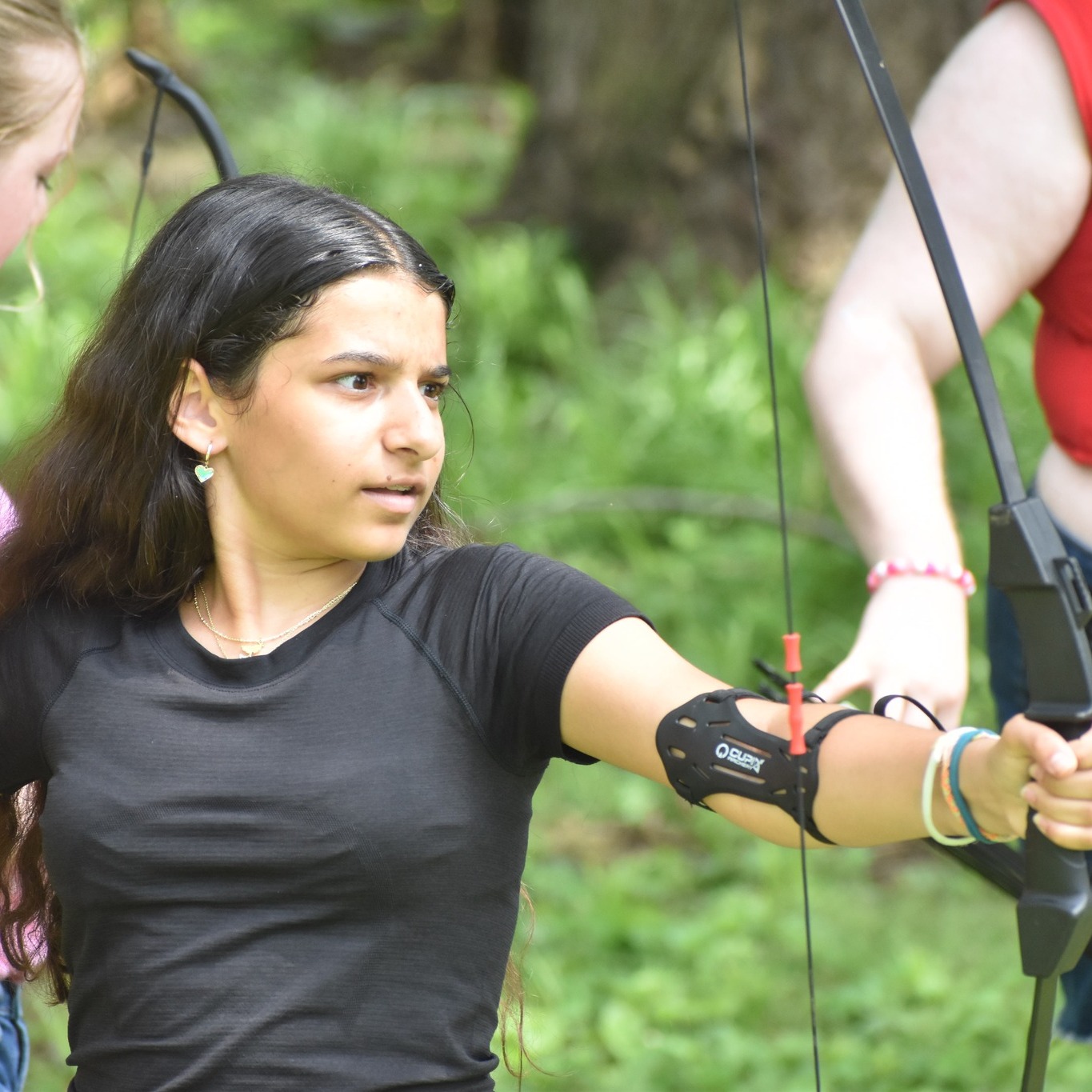We love hearing from our camp families!
Our family’s connection to the JCC started early. Both of my kids attended the JCC preschool, so it already felt like home. But it was Camp Kef that really became such a special part of their childhood.
They started at Camp Kef when they were 4 and 2½ years old, and now they’re CITs and junior counselors. Sometimes I look at them and think, wait… weren’t you just the tiny campers with oversized backpacks heading off to your first day of camp? Watching them grow from little campers into young leaders helping guide the next generation has been incredibly meaningful as a parent.
Of course, Camp Kef gives kids fun summers, but what I cherish most is the community it creates. The counselors, the staff, and the friendships formed there have truly shaped my kids in the best way. They’ve built deep friendships, gained confidence, and developed a real sense of belonging. I love when they come home full of stories, inside jokes, and that special camp energy every single day.
Another layer to this is that I also work at the JCC as a fitness professional, so our family has experienced this community from many sides. But Camp Kef has really been the heart of it for my kids.
For our family, Camp Kef isn’t just a summer program. It’s been a beautiful part of our children growing up.