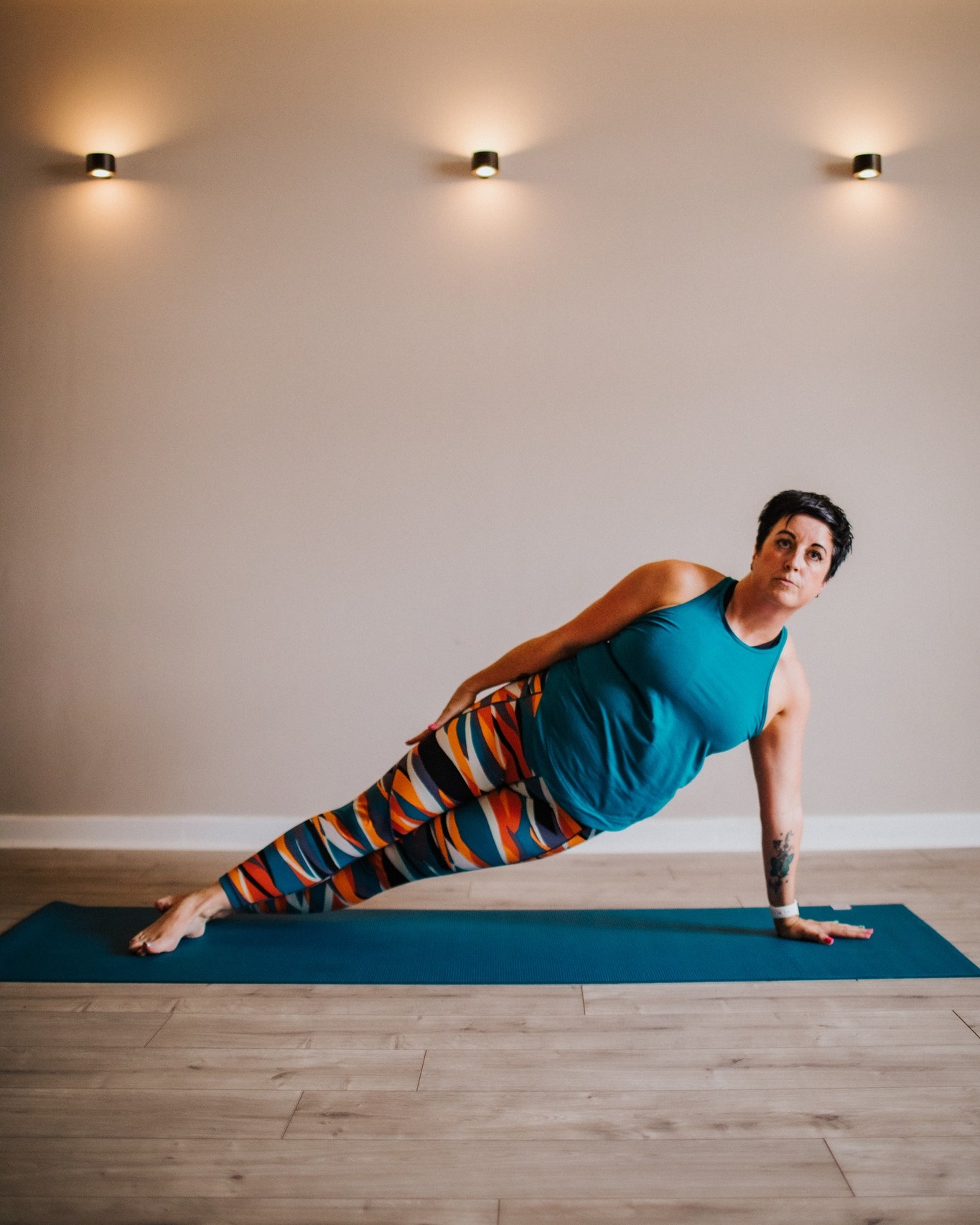 Day 26: Side Bend
Exercise 28 of 34
The biggest thing people struggle with when executing this exercise is alignment, it not only tests strength and endurance but balance and stability too.
I often talk about imagining you’re between 2 pieces of double glazing, keeping ear, shoulder, hip and ankle in alignment and looking for length through finger tips and toes. Shape wise, imagine you’re painting a rainbow with your body!
Aims are to maintain stability within the torso to keep the ribs on the abs and stop them flaring, stabilise the pelvis and lift out of the supporting hand. The initiation of the movement is all in the powerhouse!
Looking at the apparatus - Some of my favourites to help with this one are Side Bend / Twist on Chair and side bend on the cadi/tower/wall unit really help with finding that length and lift. To add spice, Star on the Reformer really does challenge, especially with the moving carriage!
👏🏻
#marchmatness #marchmatness2026 #pilates #pilatesmat #controlology #returntolife