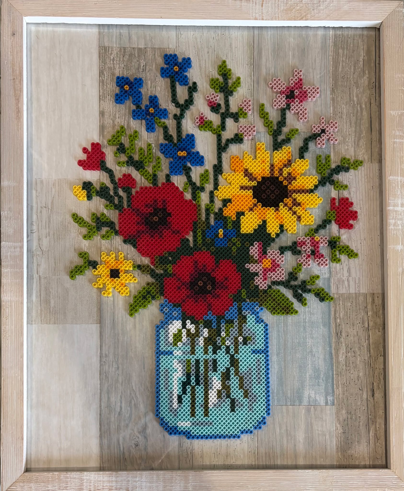 This project contains approximately 5,829 beads and took me 15 hours to complete. The frame size is 16 by 20