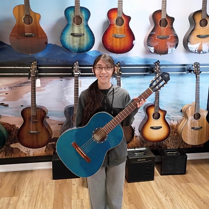 This past Saturday was a big day for our friend Destiny! She got her license 🚗 and decided to come on over, sign up for guitar lessons AND take something home from @ortegaguitars! She wanted a blue guitar and picked a beaut 💙 Congratulations, Destiny!
