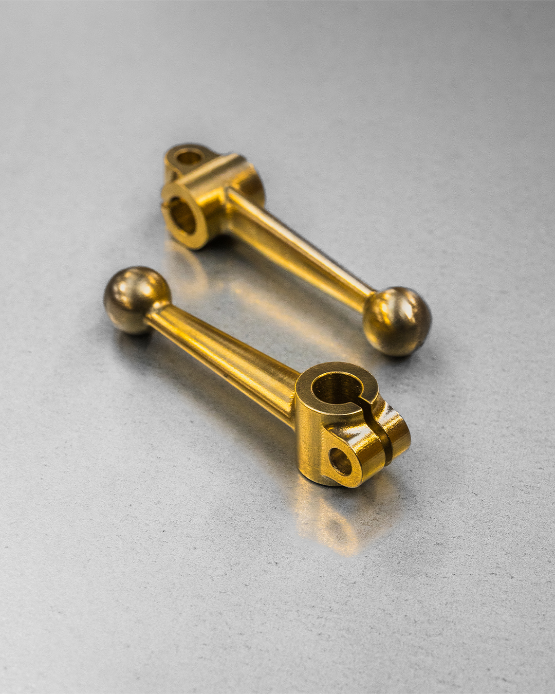 Two sections of new brass carburettor linkages, machined in-house, now ready for electroless plating.
On many pre-war cars these small components are prone to fatigue and failure over time. When originals have cracked or broken, we manufacture replacements to the correct form and function, ensuring reliability without altering the character of the car.
For owners focused on long-term use, we provide tailored engineering support where it matters most.
#Kingsbury #KingsburyRacing #MachineShop