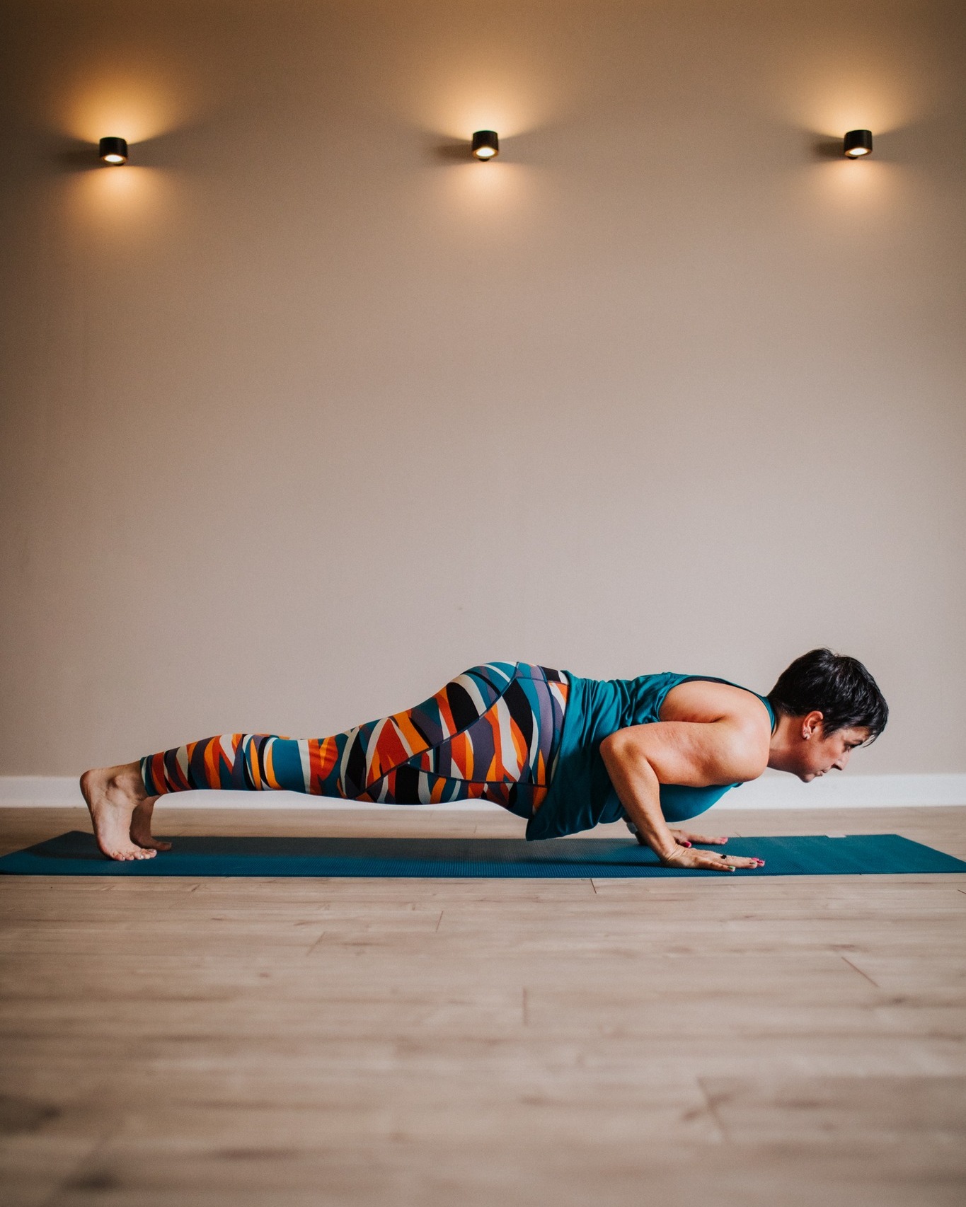 Day 31: Push Up
Exercise 34 of 34
So we reach the end of our Pilates journey, finishing with the Pilates Push Up. An exercise that is widely known and used but often executed with incorrect form and something people come to me a lot about as they want to master the strength for it!
Aims are to keep spine, pelvis and scapula in neutral, avoid dipping into lower back and sinking into shoulders. Articulate through the spine evenly and sequentially on roll down and keep weight into the centre of the feet (don’t hang out in the heels or the toes). Walk out until chest is over the hands and keep the hands at chest height and the elbows tight to lower and lift. I often like to cue drawing an arc with the chest.
Essentially, a push up is just a dynamic plank, so master the leg pull and you’ll find this easier.
Looking at the apparatus - Pull up with triceps on the chair is great for building the arm strength for the lower in the press up and the control front and back on the Reformer is amazing for finding that belly connection and length through the spine.
👏🏻
#marchmatness #marchmatness2026 #pilates #pilatesmat #controlology #returntolife
