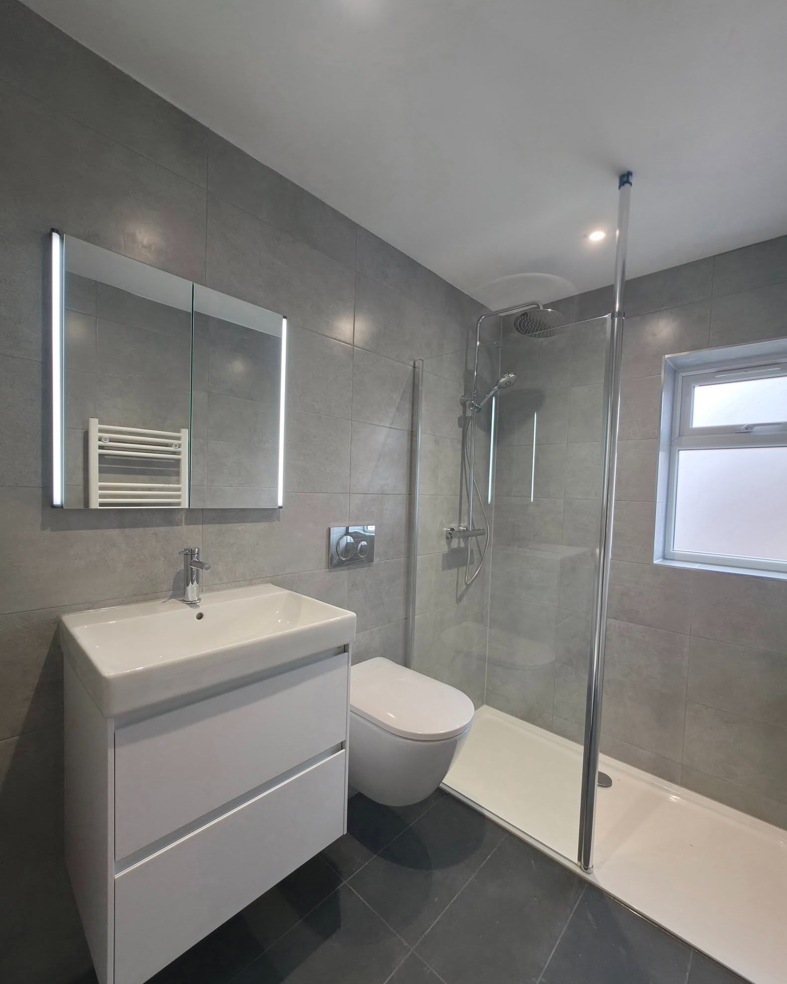 Small Shower Room Transformation
Turning a compact space into a fully functional second bathroom was the goal—and the result speaks for itself. Careful planning was key to ensuring we achieved everything the client needed without compromising on style or space.
By utilising the stud work, we’ve cleverly concealed the cistern, wall-hung frame, waste pipes, and even incorporated a recessed mirrored cabinet. This not only keeps everything looking clean and streamlined but also maximises valuable floor space while adding that all-important storage.
Fully tiled walls create a sleek, modern finish, enhancing the sense of space and making the room feel effortlessly polished. The addition of LED lighting brings the whole design to life, offering both practicality and a touch of luxury.
A perfect example of how smart design can transform even the smallest of spaces into something truly special.
Great job to the team—Jamie and Adam completed the fitting, Damo handled the electrics, and Glenn managed the plastering.
#BathroomTransformation #SmallSpaceDesign #ModernBathroom #HomeImprovement #Bathrooms #InteriorDesign #LEDLighting #SpaceSavingSolutions
www.goodwinskbb.co.uk