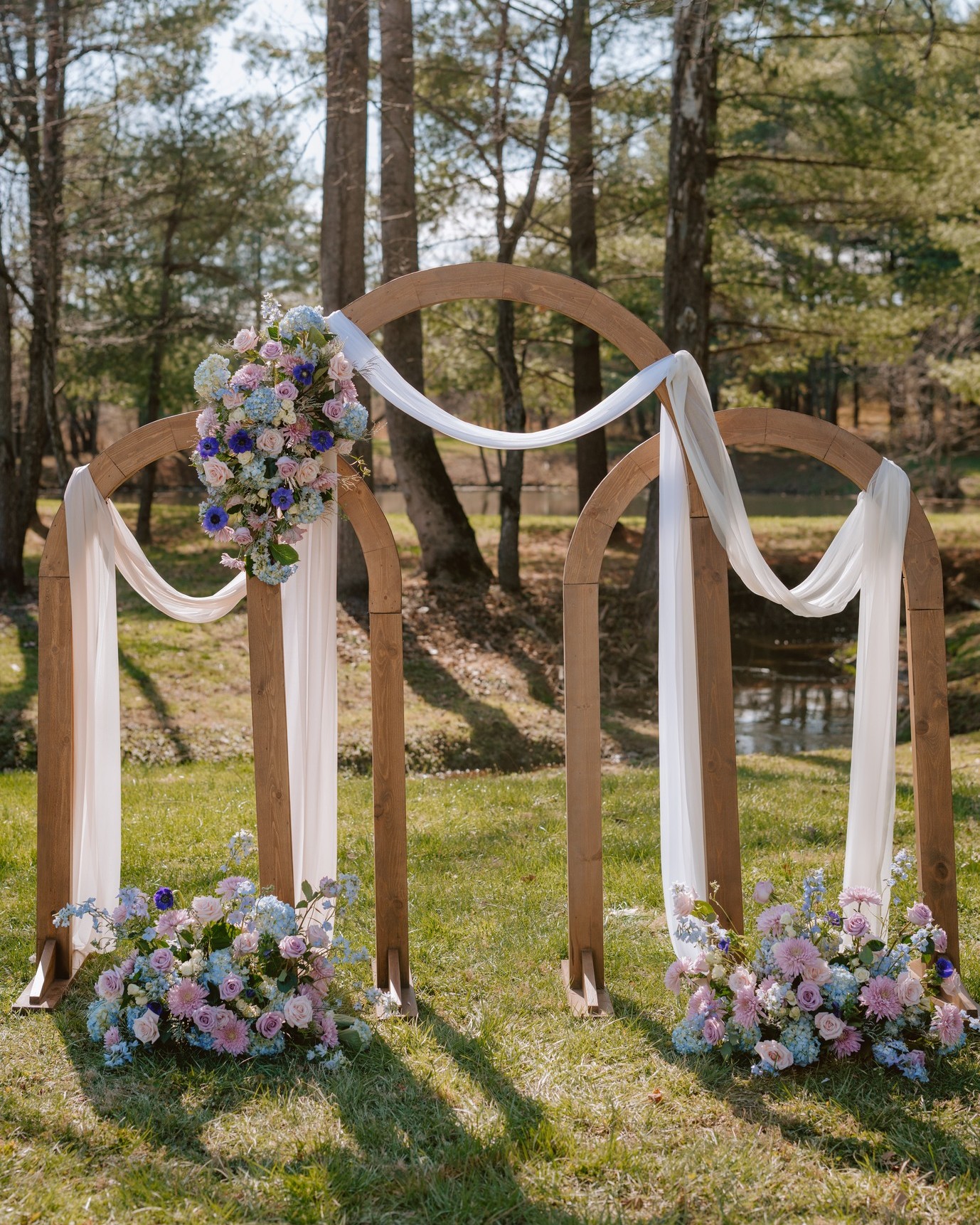 ✨ Our new arch trio and table numbers got to play at J&C's @vanishbeer wedding a couple of weeks ago. The creek in the background, the cherry blossoms, the warm sun...it was perfect. Not to mention it go decked out in gorgeous blooms from our friends at @frederickflowerfarm and photographed by the bestest, @jessivaughnphotography.
🩷 We cannot wait to share more from this wedding we helped design and plan in just 4 short months. It's rare that we get to be wedding planner, wedding designer, and wedding coordinator all at once but when we do get the chance, we love working with couples like J&C.🩷
If you're interested in renting our arch trio, or just the tallest arch solo, or any of our other epic, handmade and strong arches, submit your wish list through our website. Bonus if it's also a brewery...it means our set up crew gets a beer afterwards. 🍺🔨
What do you think about our new rental goodies?
Venue | @vanishbeer
Planning, Design, & Rentals | @sleepingbeedesigns
Catering | @rootandstemcateringdc
Photography | @jessivaughnphotography
Videography | @clayestesproductions
DJ | @thedapperdjs
Floral Design | @Frederickflowerfarm
Officiant | @revmarystoneceremonies
Guest Transportation | @onthetownlimo
Beauty | @heatherreastylestudio
Favors | @kemptownhoney; @republicoftea
Rehearsal Dinner | @tuskies
Suits | @josabank
Frederick Wedding
Wedding Coordinator
Wedding Planner
Wedding Design
Cherry Blossoms
Brewery Wedding
Virginia Wedding