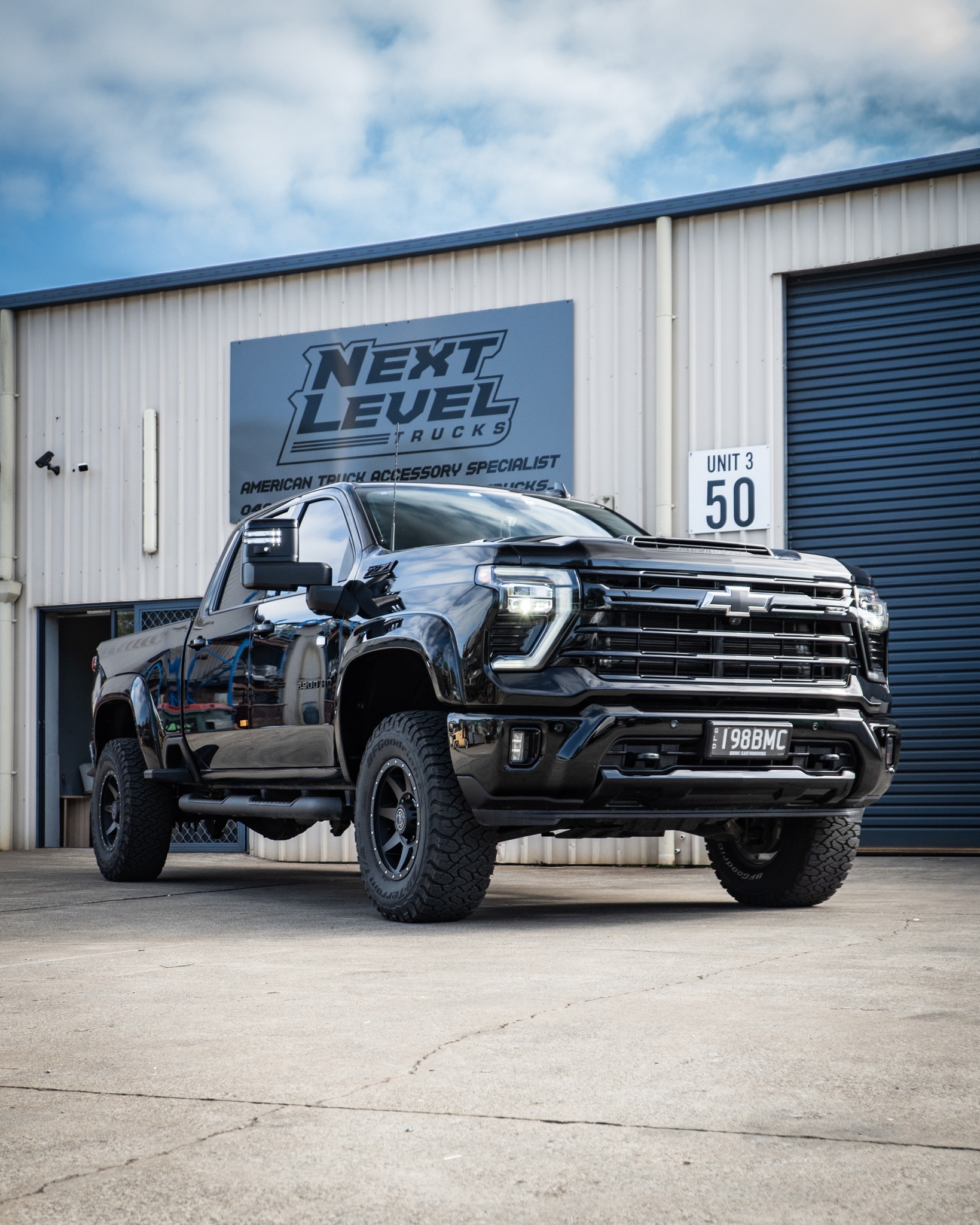 Blacked out Chev 2500 HD - Weekender Speciality
If you're looking for a comfortable ride, and want to have the ultimate stance, then you can't look past the BDS 3" Fox 2.5 DSC Kit. It's our go to, and we know you'll love it too.
You'll also notice the extended flares, Icon wheels with BFG tyres, Gen Y Hitch and light reconnect. These are all some of the great offerings we have at Next Level Trucks.
If this build or any other build interests you, reach out and let's have a chat about your next Chev 2500 or any other American truck.