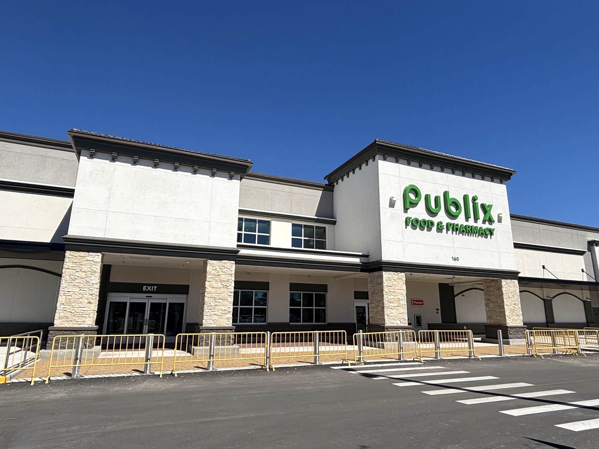 April 2nd marks the opening of the new Publix store at Seven Hills in Spring Hill, Florida.
Within the Seven Hills shopping center located in Spring Hill, Florida, we have replaced the pre-existing Publix store with this new 48,397 S.F. Publix. The new Publix was created to offer an enhanced design but at the same time retain some familiar elements seen throughout the shopping center to create a cohesive design.
The new store is sure to not only complement the existing shopping center but the surrounding community as a whole.