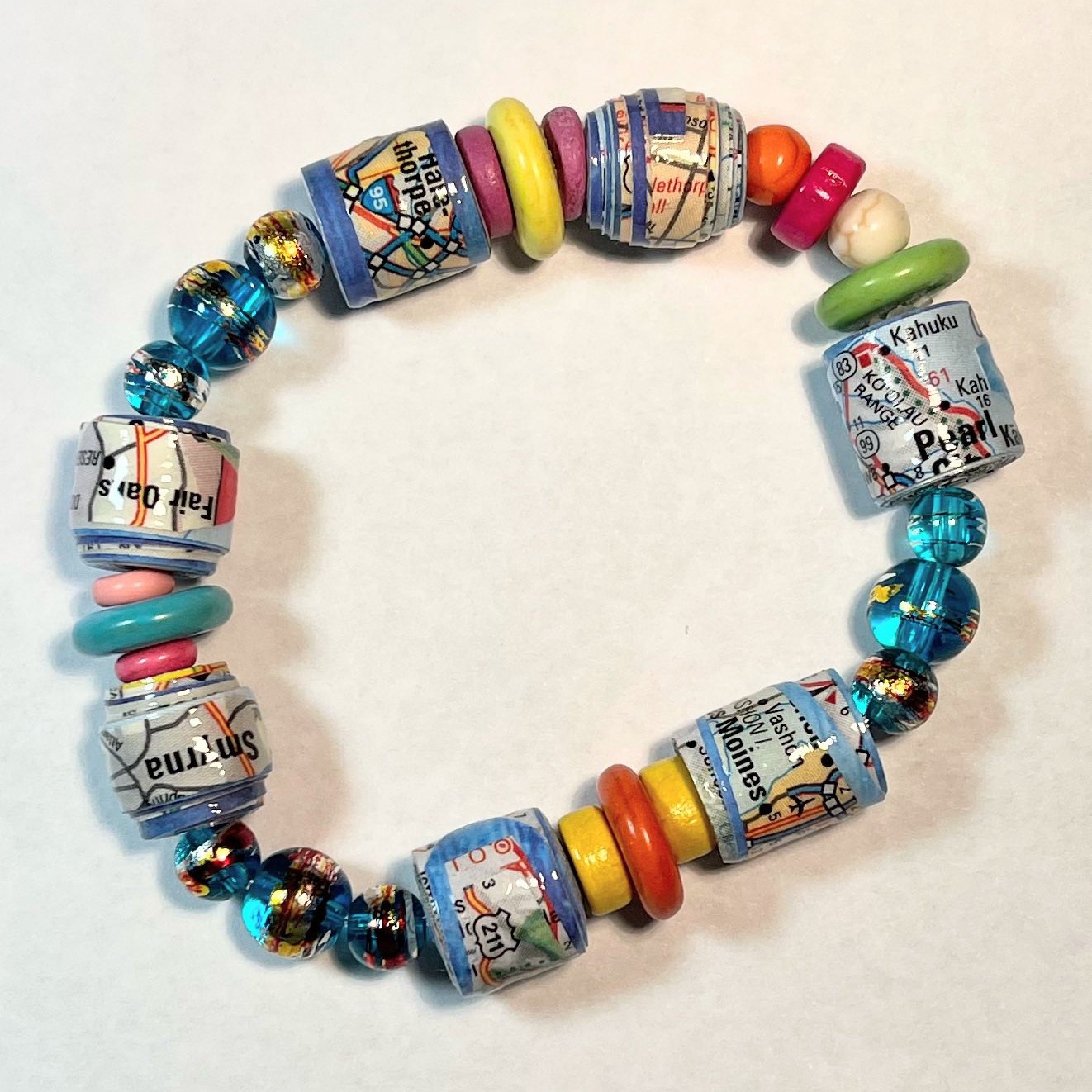 Lark will be open late tonight. Join us tonight from 5-8 pm.
Check out our HUGE selection of sale items. We need the room for new inventory!
Also, Ellen Altamore will be demonstrating how she creates her beautiful, one-of-a-kind paper beads—each piece handcrafted from unique materials like maps, sheet music, and vintage catalogues. 🗺️🎶📖
Her stunning bracelets will be available for purchase, and trust me… you’ll want at least one (or three 😉).
Come shop, watch the magic happen, and support handmade artistry! 💛