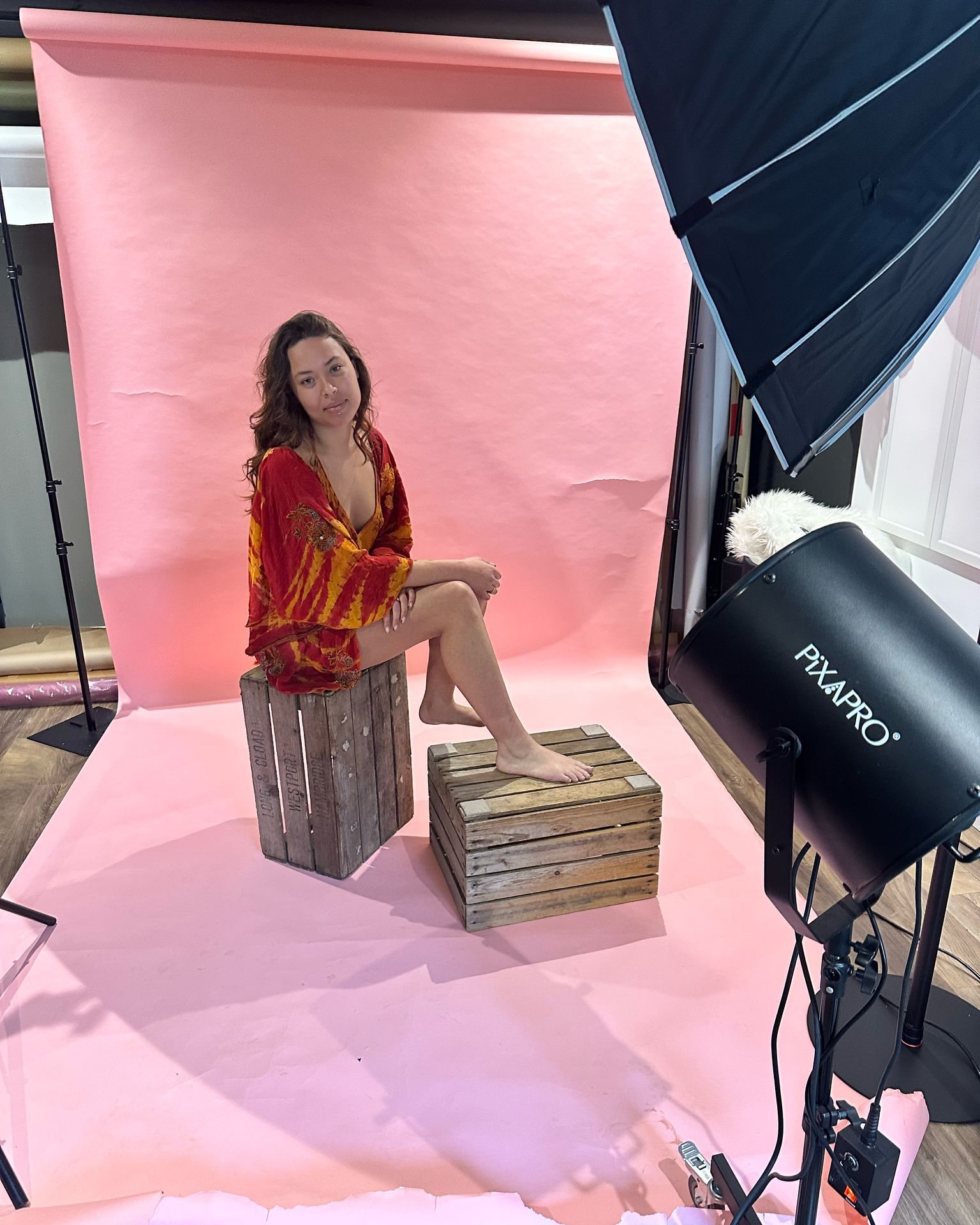 What you see vs what I see.
You see backdrop paper, crates and lights.
I see fun studio portraits with colour, personality and a finished image already in my head.
That is the difference between a setup and a photo.
The studio does not need to be complicated - it just needs the right light, the right eye, and someone up for a bit of fun.