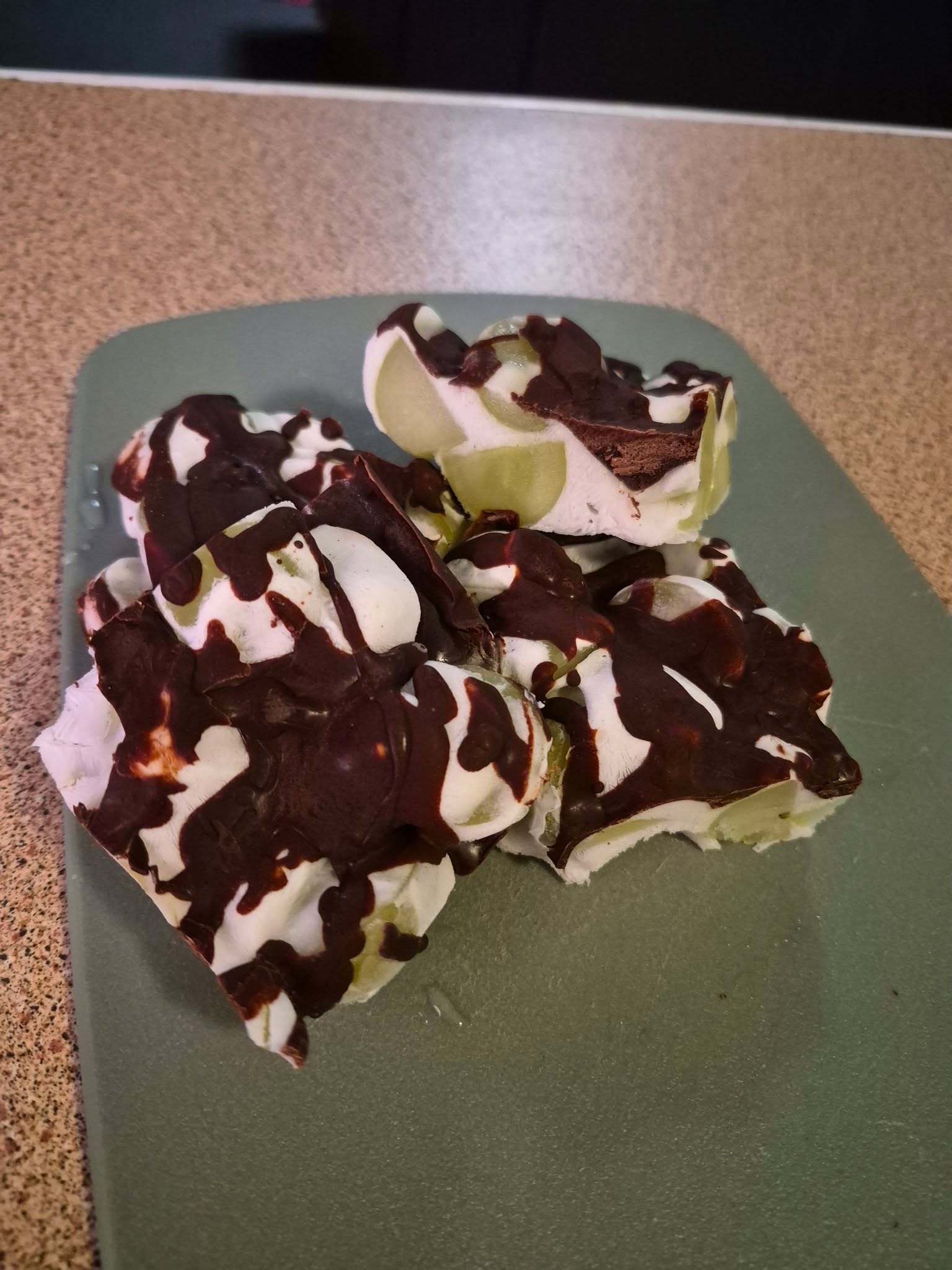 Made this off insta. Grapes in coconut yogurt topped with home made chocolate. I froze it so I get sore teeth from the cold when I eat it.