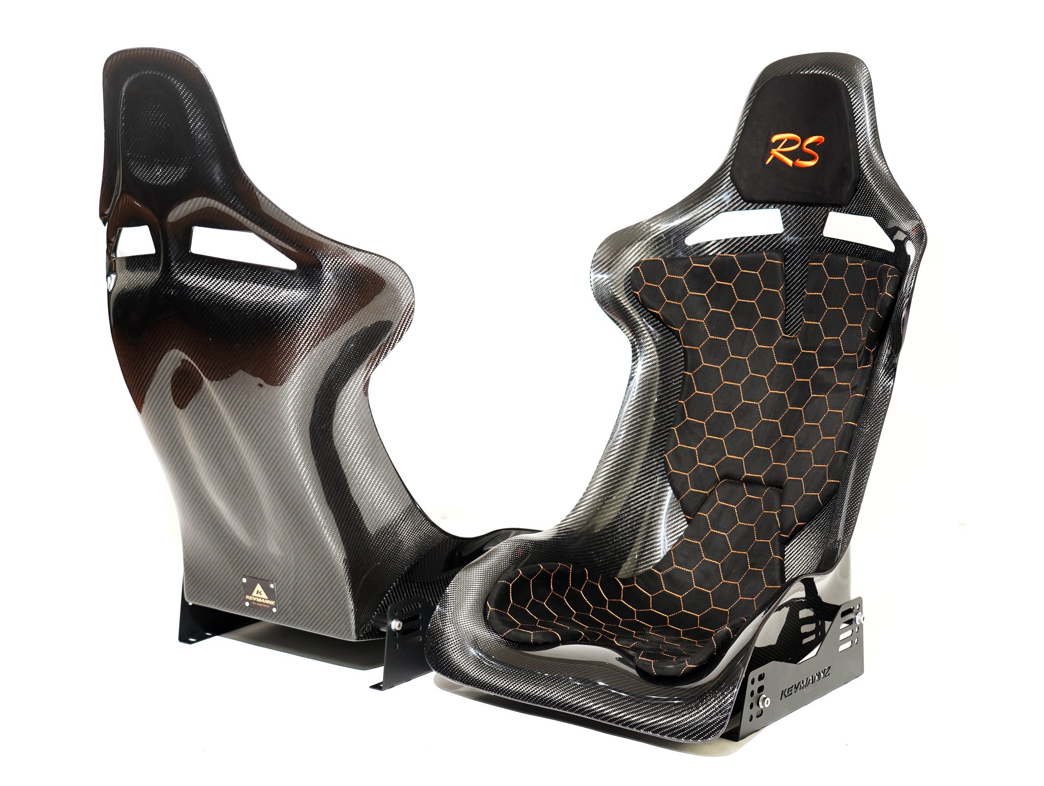 CF Seats V5 with black Alcantara padding and orange honeycomb stitching pattern + orange Audi RS logo on headrest padding.
