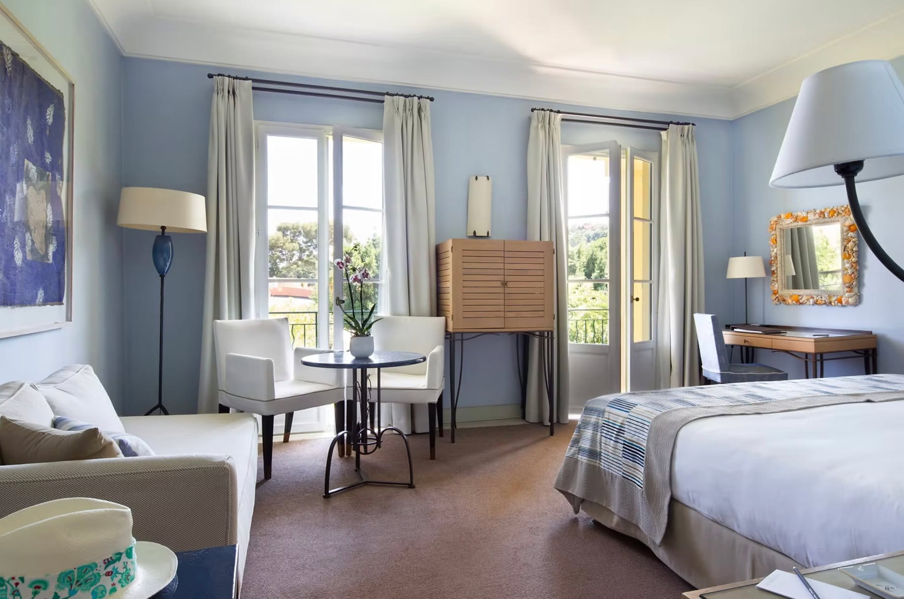 The Hotel Royal Riviera is perched in the peninsula of Cap-Ferrat, with plunging views of the Provencal gardens and the Mediterranean and boasts a total of 94 luxury appointed rooms and suites, 78 of which are in the main building. Designed to reflect the landscape of the south of France, the majority of the rooms overlook the sea and gardens. The private villa l’Orangerie features 16 additional rooms and Suites decorated in the purest Saint-Jean-Cap-Ferrat style. Each room, each window, each balcony offers a real enchantment of nature: each room is an invitation to pleasure.
For details info@dominiquedebay.com or by phone 1-212-752-1416 or WhatsApp 1-917-940-2407 #royalriviera #DominiqueDebayCollection #view #pool #luxuryhotel #frenchriviera #cotedazurfrance #leadinghotelsoftheworld @royalriviera #FrenchRiviera #PrivateBeach #SaintJeanCapFerrat