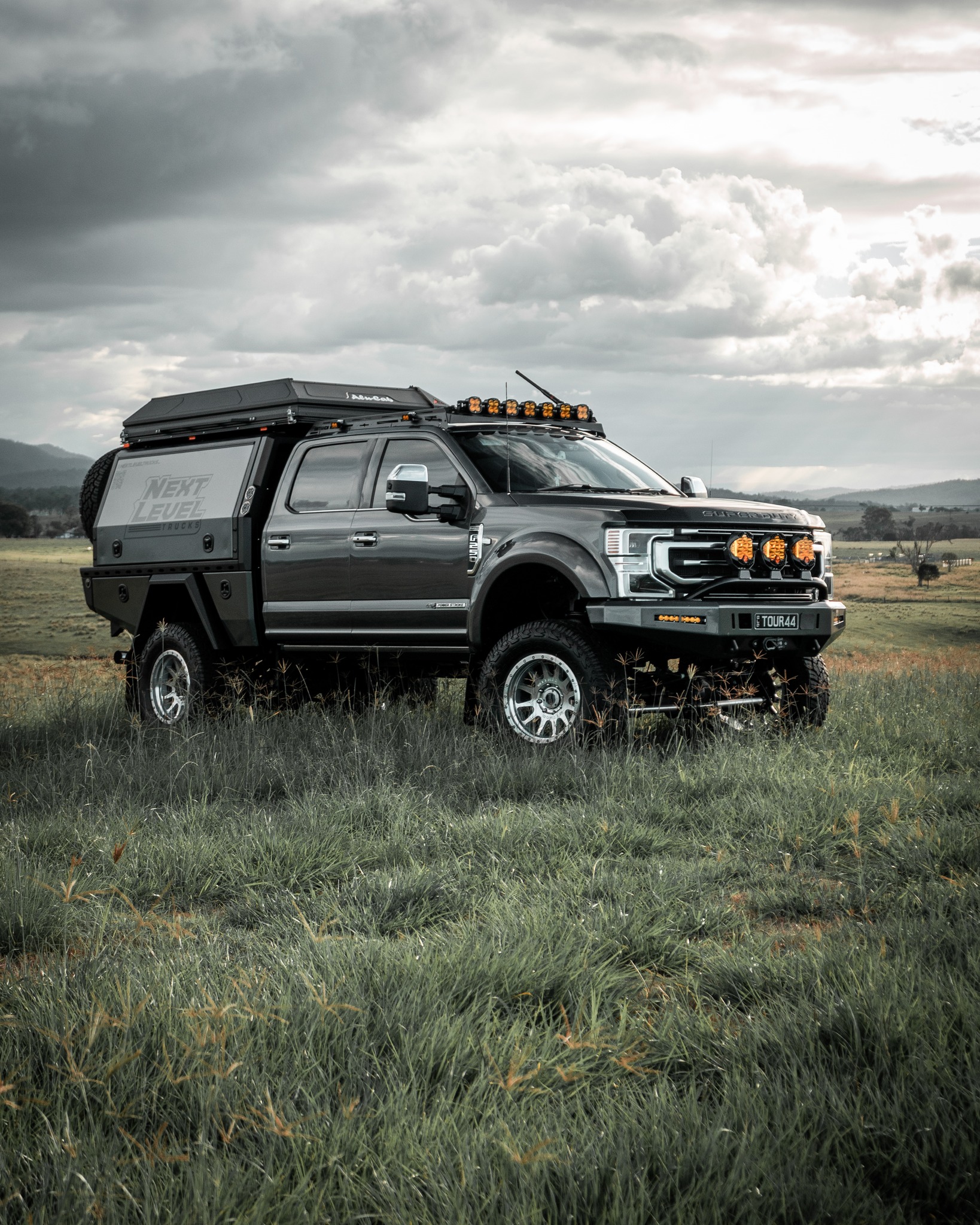 Built for Touring
We don't just build touring trucks, we lived the touring life FULL TIME! Our Ford Super Duty was the basis to the beggining of Next Level Trucks and what it is today.
Living the on the road life showed us our passion for the touring lifestyle, and helping others achieve what we did. Testing the brands and learning what works and what we think could be over looked.
If you want to discuss life on the road, your build and everything in-between, reach out. We loved the lifestyle and the brands we have come to love and trust.
Our current setup is fitted out with @bajadesigns.au lighting all round, @outbackkitters front bar, @Gwrks Tray and Canopy, @Alucab_australia roof top tent, @methodracewheels_anz wheels and a wide range of extra accessories that we have grown to love and rely on.