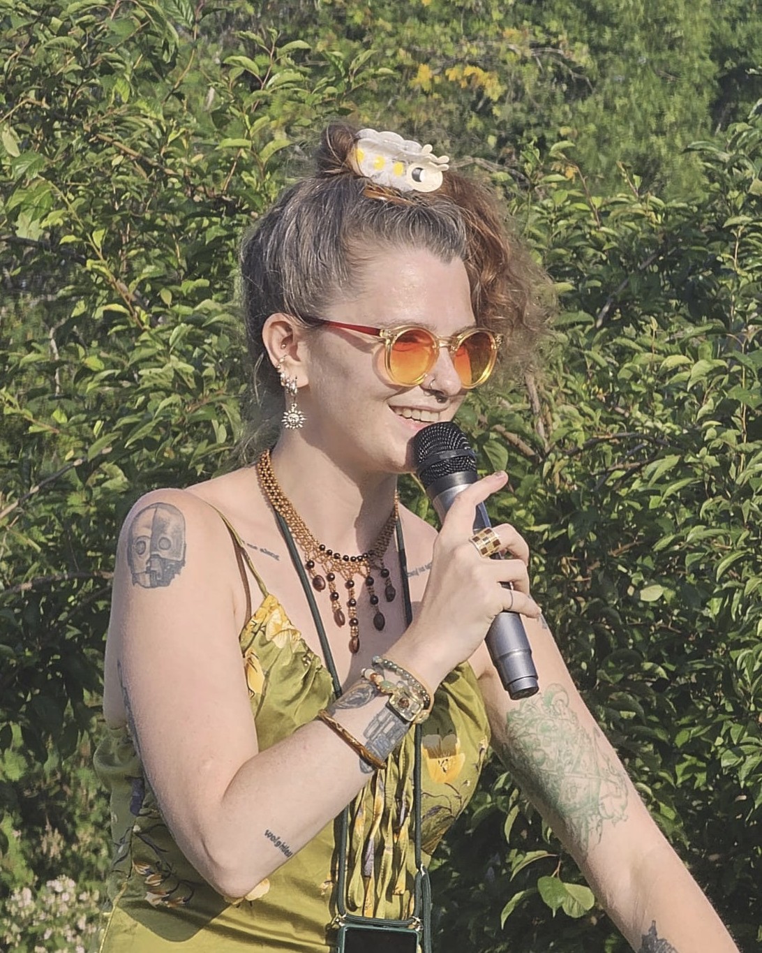 Meeting the Fruit & Nut Village Team!
Charlotte @charley_mwc McDermott is our Communications & Funding Officer. She has worked with non-profit organisations - in the community, environment, and arts sectors - for several years, with previous experience with groups such as The International Society of Arboriculture, Birmingham TreePeople and Calthorpe Residents Society. She is also the Office Manager for @municipaltreeofficers, volunteers for the CAVAT Group, a part of @accessabilityarts, and runs @sandwellpoetslaureate.
Charley holds a Masters in Writing, and when she isn't constructing our bulletins and posters, updating our website and social media, writing press releases and funding applications, she also spends her time writing poetry and performing around the West Midlands and beyond. She attends a few sessions each month, learning new skills, helping with tree planting and pruning workshops, and hosting Summer Solstice and Wassail events.