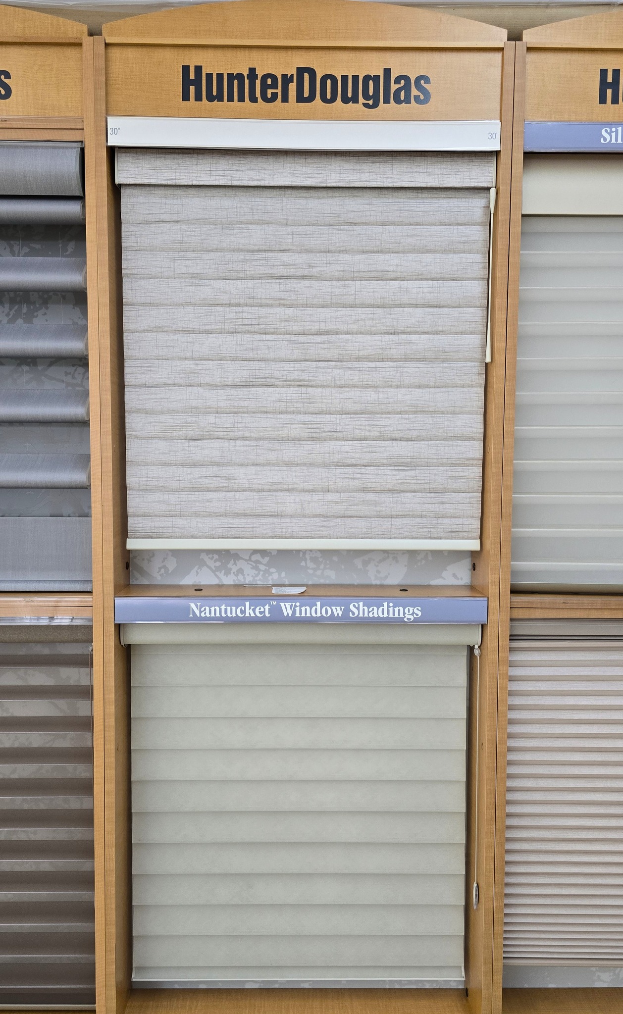 Looking to upgrade your window treatments? We’ve got you covered with Hunter Douglas shading.
From classic blinds to modern shades, we carry all styles along with plenty of sample books and color options to help you find the perfect fit for your space. Whether you want something soft and subtle or bold and statement-making, there’s a look for every room.
Want convenience too? Ask about automatic shades, remote control options, and smart features that make adjusting your lighting as easy as pressing a button.
Stop into the showroom to explore all the options and find the perfect Hunter Douglas shades for your home.