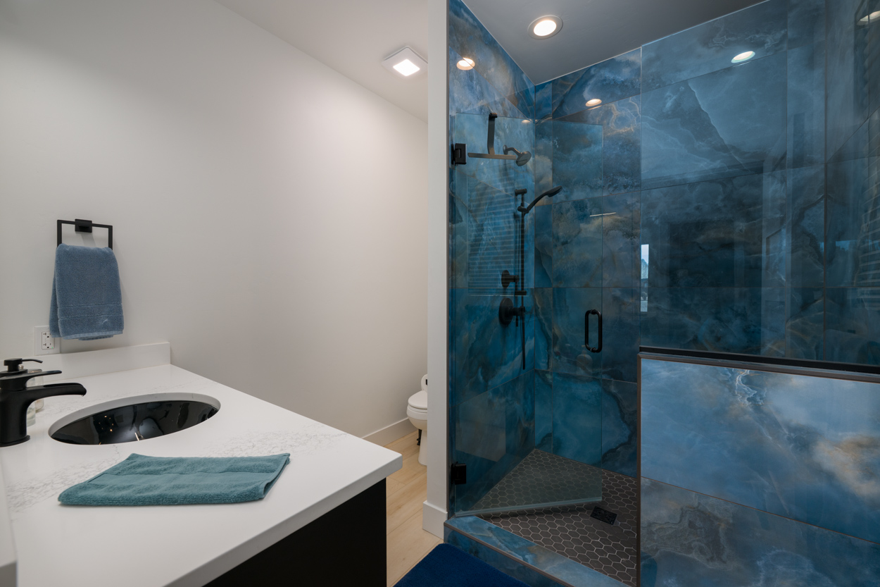 A study in contrast.
Soft white.
Deep blue.
Nothing competing—everything intentional.
The texture carries it.
Movement in the tile,
stillness everywhere else.
It’s less about the space and more about the feeling inside it — cool, quiet, contained.
Like stepping into a different pace for a minute.
Because sometimes design isn’t meant to stand out — it’s meant to take you somewhere.
📩 If that’s the feeling your project deserves, let’s create it.
#bathroomdesign #architecturalphotography #interiorcontrast #modernbathroom #designintent #designinspiration #joncahillphoto #coloradocustomhomes @bwdconstruction