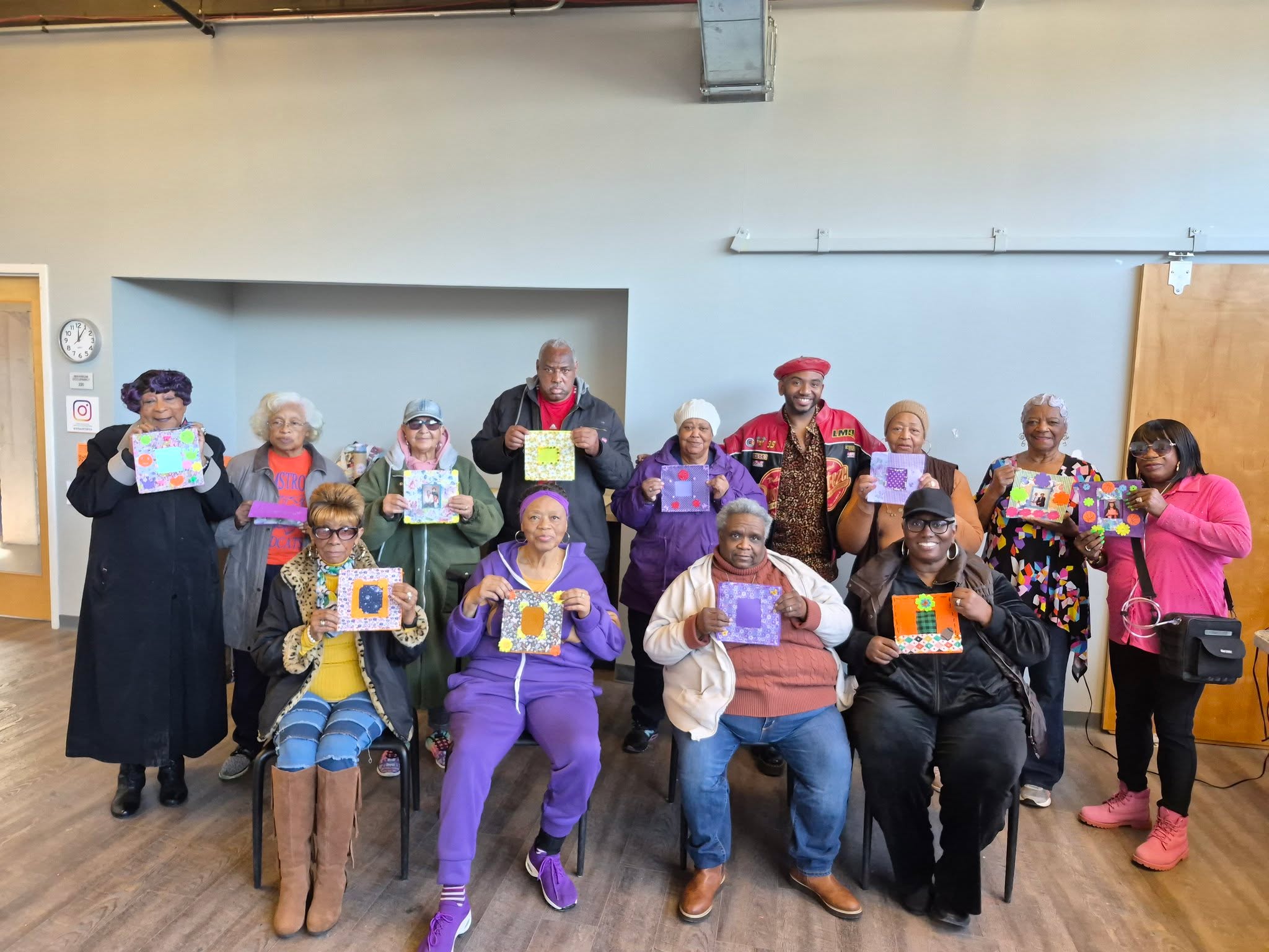 The Visual Arts Center of Richmond (@visartsrva) welcomed the Older Adults who traveled to view the exhibit “State of Flux." The visit offered Older Adults an opportunity to explore contemporary art while reflecting on the themes of change, transformation and personal expression.
Participants took part in a hands‑on art activity inspired by the artwork they had seen. The group was guided by Justice Dwight (@justicedwight), one of the exhibit’s featured artists who is pictured with the Older Adults and their completed projects.
This visit blended observation, creativity, and conversation, allowing participants to connect art with their lived experiences.