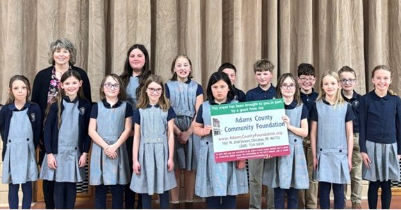 The Adams County Community Foundation (ACCF) recently awarded a grant to Three Oaks Christian School (located in at the former Southeast Elementary School) for updated stage curtains.
The stage is used for professional presentations, theater productions, musicals, and special events. They noted the plastic curtains crackling and disintegrated. They applied for an ACCF grant in hopes to assist with the purchase of fabric stage curtains.
Kristi Gerber, Three Oaks Christian School grant representative, expressed appreciation to the ACCF for this support. Ryan Hirschy, ACCF grants committee member added that the ACCF is pleased to support the Three Oaks School and local educational programs.
This ACCF grant was made possible through unrestricted funds sponsored by the Roger & Betty Singleton Memorial, Victor B. and Kristine Porter, and Wayne & Karen Porter Community Enrichment Funds.