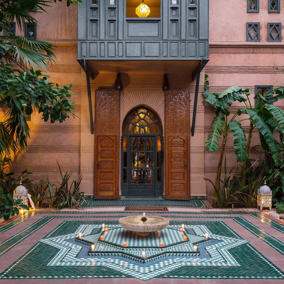 This is your sign to slow down.
Hidden behind a discreet gate, Dar Rhizlane reveals itself quietly, almost like a secret waiting to be discovered. From the very first step inside, the city softens, and what unfolds is a sense of calm, surrounded by greenery and a timeless, almost hidden atmosphere.
This entrance is more than a doorway, it is a transition. From Marrakech’s energy into something more intimate, more serene, where every detail invites you to slow your pace and arrive differently.
Dar Rhizlane is not just a place you arrive at, it’s a place you arrive into.
Save this for when you need an escape.
#DarRhizlane #marrakechescape #luxurytravel #boutiquehotel #moroccotravel