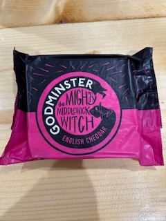 NEW in the farmshop this week our first cheese from Godminster Bruton Dairy, The Mighty Middlewick Witch English Cheddar. Billed as having 'a flair for fun and mischief, the Middlewick Witch sprinkles her magic on anyone in need. You can taste a hint of her magic in every bite of the English mature cheddar cheese'.
Why not come and try this tasty cheddar? We don't think it's going to hang around for long.