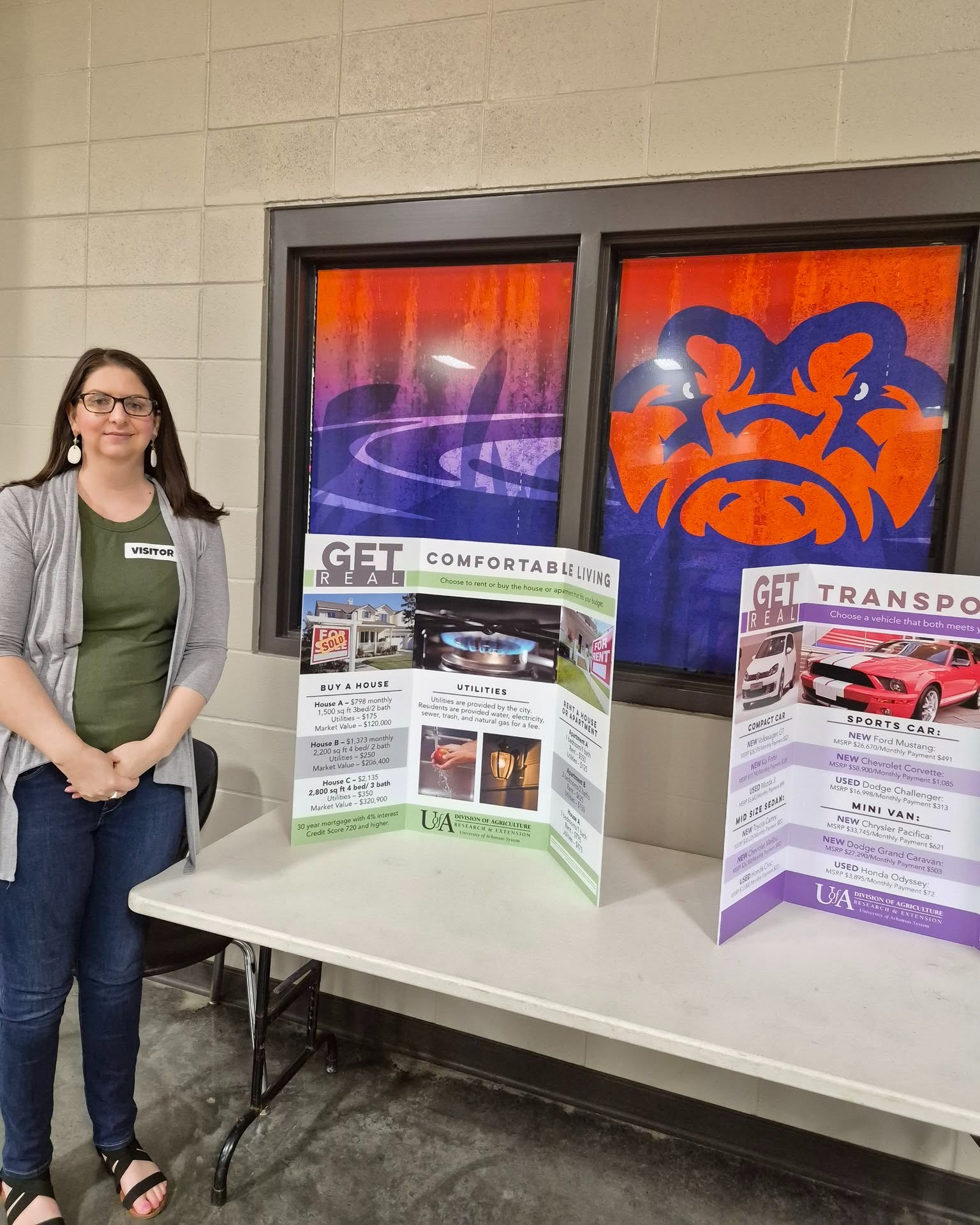 UHDC' Housing Counselor, Elizabeth Wilson, is shown participating with Two Rivers High School's Ready, Set, Graduate! Event held 4/11/26