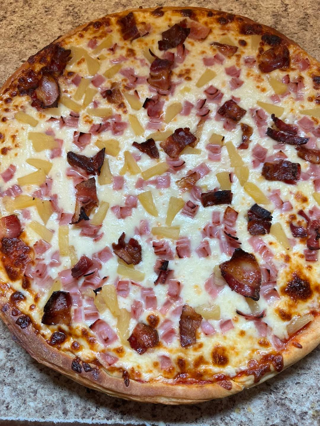 Hawaiian pizza with bacon!
Call 802-933-5001 to order