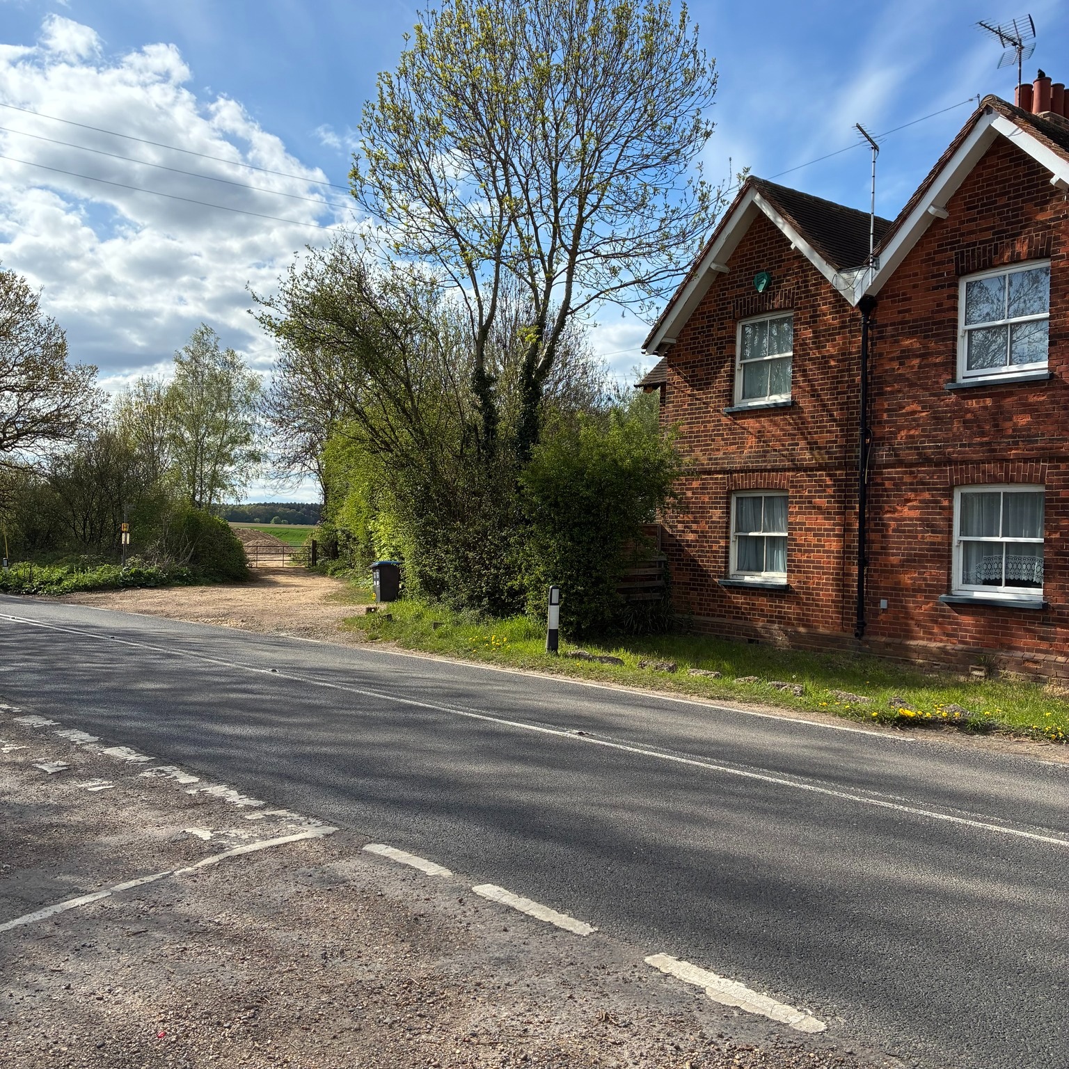 Temporary Farm Entrance
Listen up concrete fans, the entrance to the farm is getting a brand new driveway to seamlessly dovetail with the nearly new surface on Symondshyde Lane.
The work will take place over the next few weeks and there will be no access to the farm from the normal entrance on Symondshyde Lane. So, to get to the farm and to the brewery we're setting you a challenge worthy of Top Gear back in its heyday.
This will sound worse than it actually is, but bear with us, we think you'll grow to love it.
Basically you need to take a track off Coopers Green Lane. It's probably best to approach from the Welwyn Garden City end of Coopers Green Lane. Coming from the other end (St Albans) it's a pretty tight left double back, probably OK in a car going extra slow, probably not doable in an 18 ton truck. So we'd suggest approaching from the WGC end.
More details to help locate the start of the track:
The postcode is AL10 9BQ.
What 3 Words is hung.labs.short
On Google Maps the lane almost opposite is marked as White Gate Cottages
On Apple Maps the lane almost opposite is marked as Great Braitch Lane
On Waze the lane almost opposite is unmarked
Travelling from the Green Lanes / Coopers Green Lane roundabout travel towards St Albans you need to go around 500-600 metres. You will see a brick house on the right (pictured above) and the track is immediately after that. Approach slowly, be mindful of quick traffic coming in the opposite direction, turn right onto the track and you've done the tricky bit. It's recently been gravelled so it's fine for most vehicles. Carry on along the track for about 1.5km and you're at the farm. There's a dog leg in the middle, and the views are awesome. It's mainly single track but broadens out in several places for passing traffic.
The first photo is the turning (and the house for reference) when approaching from WGC.
The second photo is the turning (and house) when approaching from St A
Don't be put off! We're open as normal and with the weather getting better it's the most beautiful spot to enjoy a beer or two. And we've got a very special offer on a nearly new ironing board!
Godspeed beer lovers.