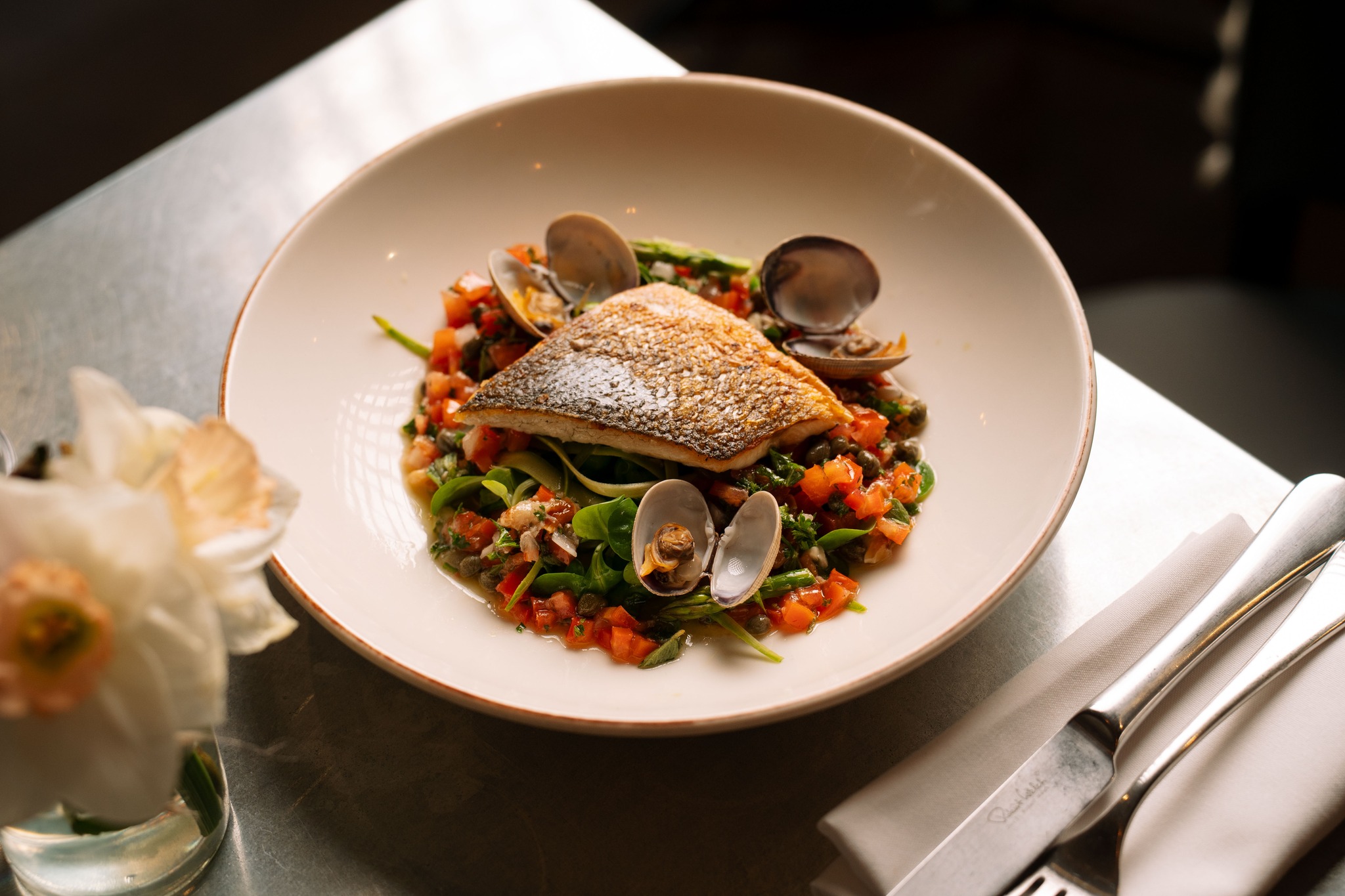 Wild Bass, Sauce vierge, spring salad.
Clean, fresh and full of flavour.�
A lighter option that still delivers.
#thedogatwingham #top50gastropubs #SpringMenu #visitkent