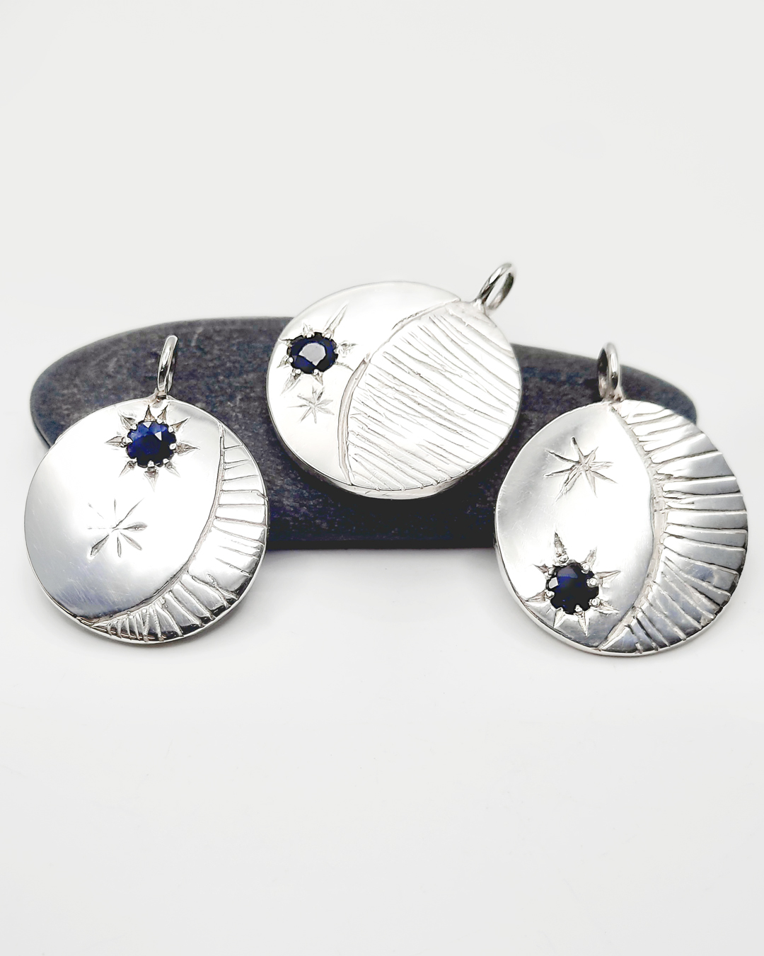 A new student came to me with an idea of creating 3 separate pendants for her granddaughters. Each piece represents the 3 difference phases of the moon when they were born. Each would feature a blue sapphire sourced from Sri Lanka during her 1981 travels.
During my wax carving workshop, she carved all 3 designs into the wax. The wax models were then cast in sterling silver and returned to be cleaned, polished, and star-set with the sapphires, with a little expert help, of course ;)
What a beautiful idea to create and pass on to her grandkids... ♥ What do you think?
.
.
.
#waxcarving #sapphirependant #diyjewellery #moonpendant #illawarra #jewelleryworkshop #creativeworkshop #oneofakindjewelry #uniquejewellery #ydjewellerydesigns