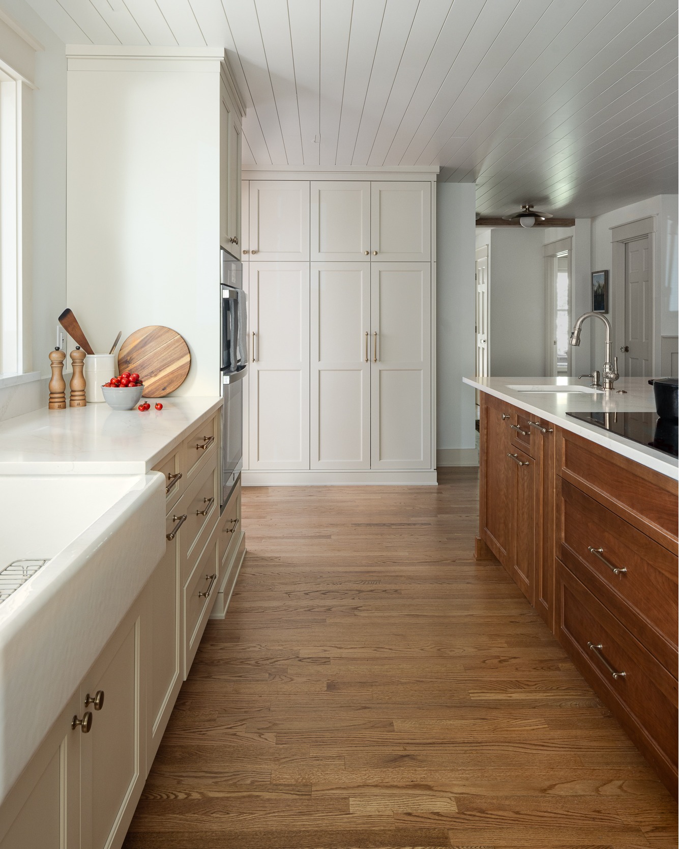 Davidson is one of our favorite small towns! This project was so charming and the finished spaces are exactly what our clients dreamed of! The kitchen renovation included an addition to double the size, giving these homeowners a giant entertaining island with prep sink. We love the cozy feel of the tongue-and-groove ceiling, creating interest and a touch of detail that finishes the space. These semi-custom cabinets include many upgrades, but our favorite is the pull out cutting board drawer over the trash cans! What is your favorite detail in this space?!
If you are dreaming of a new kitchen this year, now if the time to get started on a conversation so your Holidays can be experienced in a brand new space! Contact us now to get on our free-consultation schedule!!
Design: @asanodesigncollaborations
Architect: @nicoleperriarchitecture
Builder: @turnerdesignbuild
Photography: @beccabondphoto
#DesignBuild #kitchendesign #Homedesign #davidson #homebuilder #customrenovation