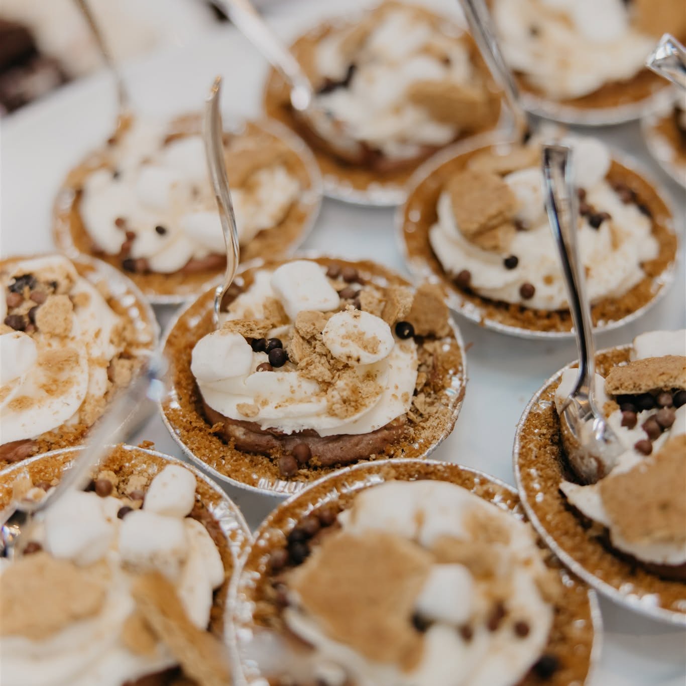 Cake is great—but when it comes to dessert, the more the merrier 🍰
Our caterer, @mintahoe, knows how to do sweets right. Think mini pies, sweet shooters, brownie pops… what’s not to love?
These bite-sized treats are the perfect way to close out any event and keep guests coming back for more. From weddings and galas to corporate parties and banquets, a variety of desserts means there’s something for every sweet tooth.
Because one dessert is never enough 😍
Decor: @hautehousestudio
Photographer: @mycahbainphoto
Live Painting: @customkeepsakedrawings
Photo Booth: @mobile.memories
Lounge Furniture: @dreamdaydressingrooms
DJ: @wildchordsdj
Officiant: @perfectday_affordableidos
#MintahoeEvents #MinnesotaCatering #TwinCitiesEvents #DessertTable #EventInspiration