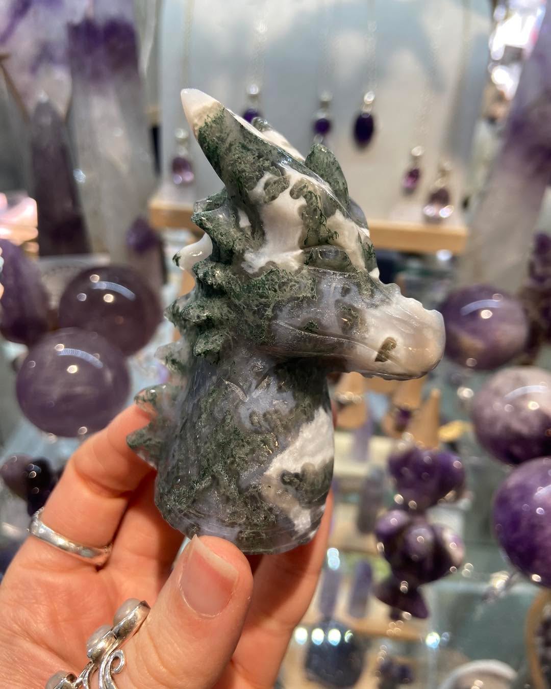 For all the fantasy lovers out there you look at our new Moss Agate Dragons 🐉✨🌟
These would look great as part of a book shelf display or fantasy crystal display. Moss Agate is associated with nature, self growth and grounding
For more information or to purchase give us a message or comment down below
.
.
.
#crystalshopuk #mossagate #crystaldragon #witchycrystals #crystalmagic