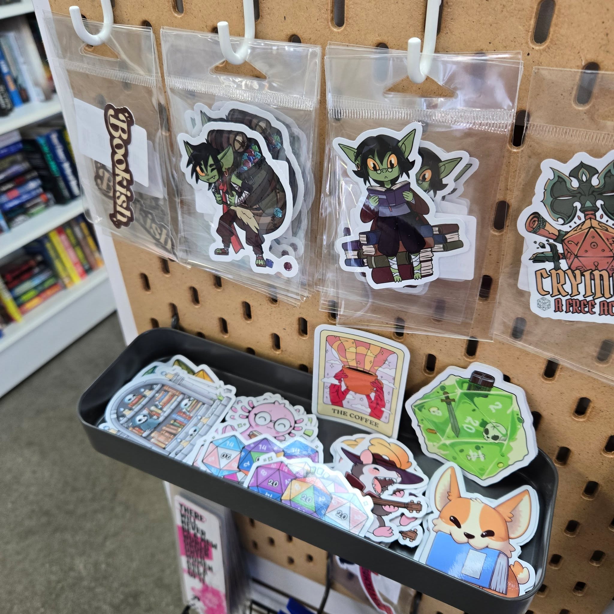 Teacher gifts that aren’t mugs.
(You’re welcome.)
Try
✨stickers (these are from @mimicgamingco )
✨fidgets for them or their class
✨a penholder bookmark from @a.houseofbooks
✨Decor for their bookshelves from the Brit
✨Book-themed desk supplies - pens or bookmarks fit in this!
✨Self-care supplies like chapstick or waterbottle holders from @sewfisticatedfabricology
(Gift cards are always good too.)