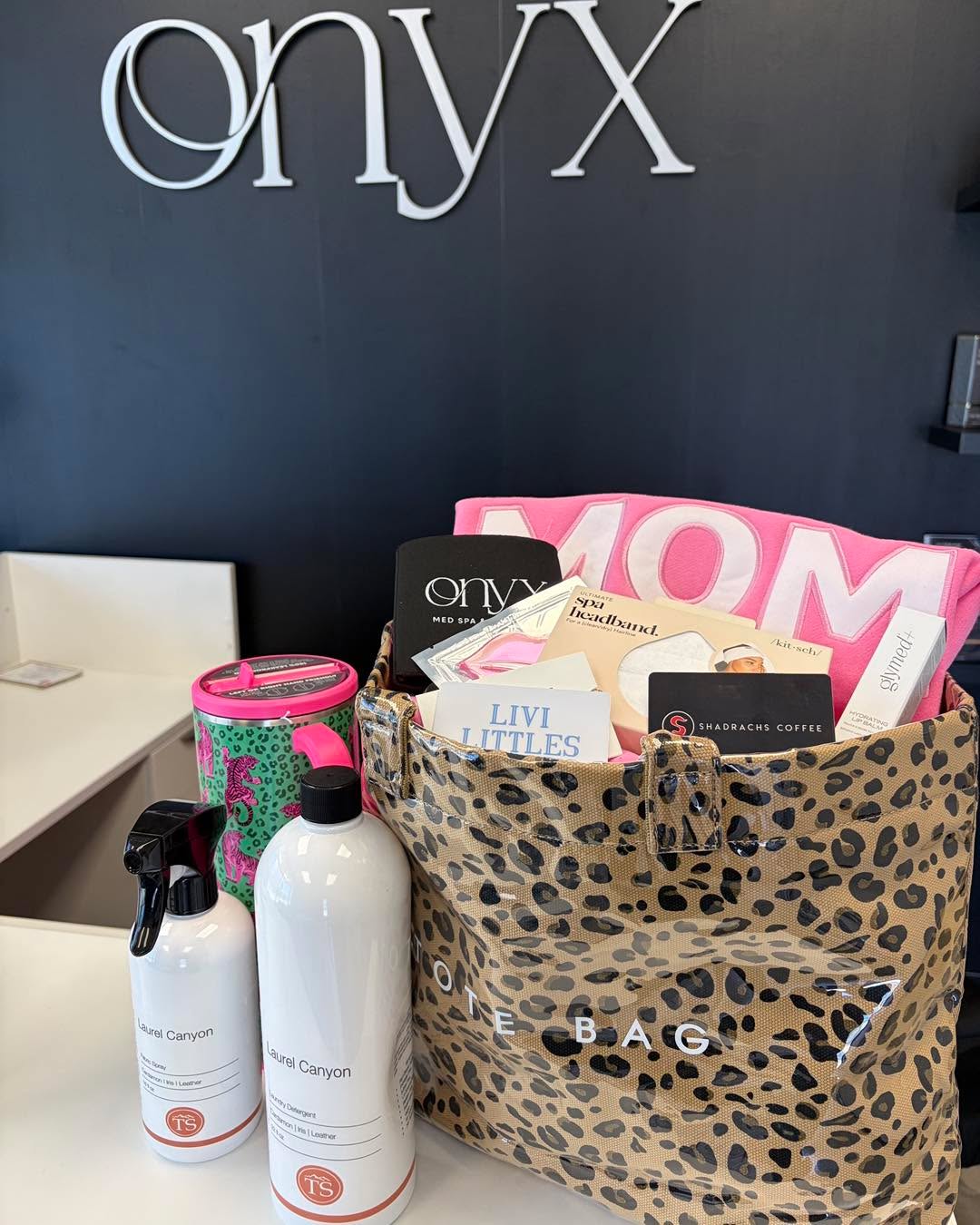 If the exclusive specials and new service launches weren’t enough… this giveaway is your sign to stop by tomorrow’s Mother’s Day event. ✨🤍
One guest will win:
• Leopard Tote Bag
• GlyMed Lip Balm
• Lip Mask
• Swig Tumbler
• “Mom” Mock Neck Sweatshirt from @shophoney.hope
• Topanga Laurel Canyon Detergent
• Topanga Laurel Canyon Fabric Spray
• Onyx Coozie
• $100 Livi Littles Gift Card
• $50 Shadrach’s Gift Card
You do not have to be present to win, but you do have to stop by and enter your name in the basket.🖤
We will see you tomorrow! 😘