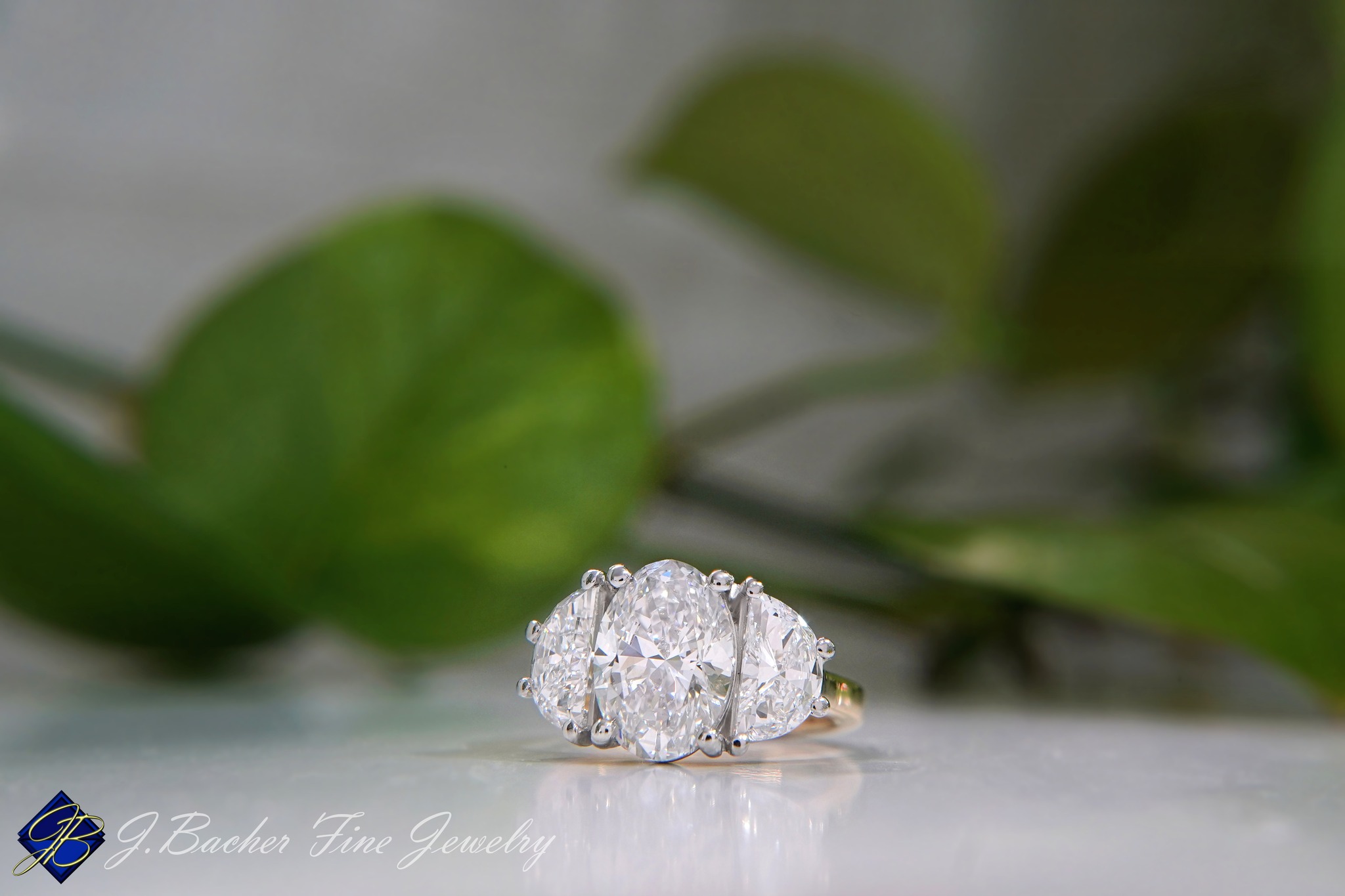 ๐ Cassi & Ridge
Congratulations to you both on your wedding! It was a pleasure being part of this special time.
Cassiโs engagement ring is a stunner - a three-stone design featuring an oval center with half-moon side diamonds, set in a beautiful mix of platinum and yellow gold. Paired with matching polished yellow gold bands, the look is simply timeless.
Wishing you all the best as you settle into married life together. Weโre so happy for you both! ๐