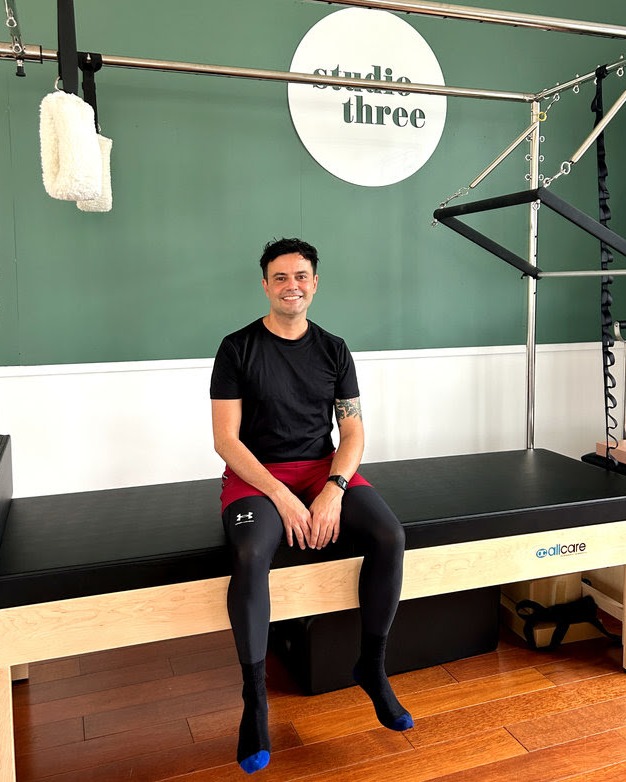 Welcome to our latest new face around Studio Three - Doug Machado!
Originally from Brazil, Doug has been practising Pilates since 2012 and is comprehensively certified with Polestar Pilates in 2025. With over 600 hours of training and a strong focus on the โhowโ and โwhyโ behind the method, his approach is both considered and detail-oriented.
Dougโs passion lies in comprehensive sessions using the full Pilates apparatus, allowing him to focus on the unique goals of each individual.
He joins Studio Three as a Studio Sessions instructor and is also available for private sessions.