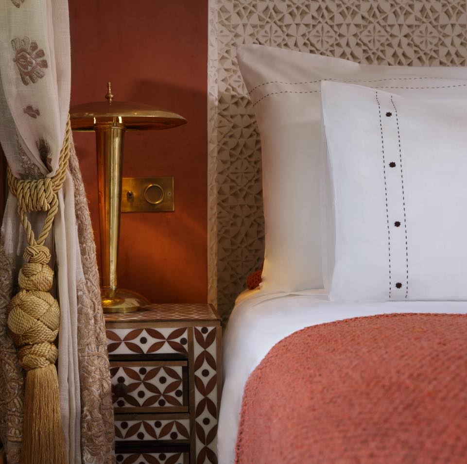 Soft light, handcrafted details, and a palette inspired by the earth itself — every element comes together to create a space that feels both intimate and timeless.
From the carved plaster arches to the geometric zellige underfoot, the room unfolds as a quiet dialogue between tradition and comfort. Spaces like these are designed to be lived slowly, where mornings begin with filtered sunlight and evenings settle into warmth and calm.
More than a room, it’s an atmosphere shaped by texture, light, and thoughtful design — a reflection of the Moroccan art of living, where every detail carries meaning and every corner invites you to pause.
#riadliving #marrakechstyle #interiordetails #moroccandesign #luxurystay #designinspiration